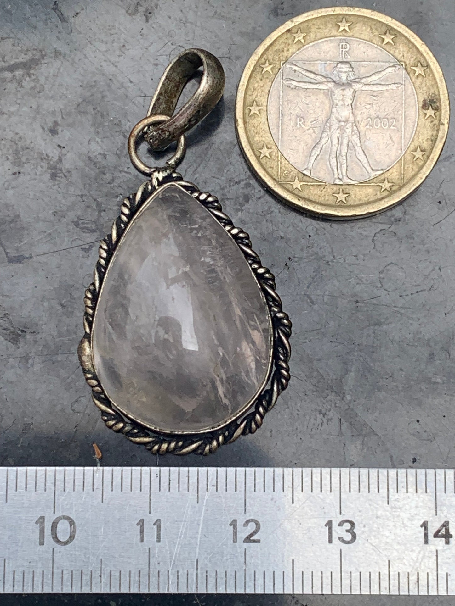 Rock crystal/Rose quartz! Pendant measuring 44mm high x 23mm wide x 12mm thick. Sold with an adjustable black cord!