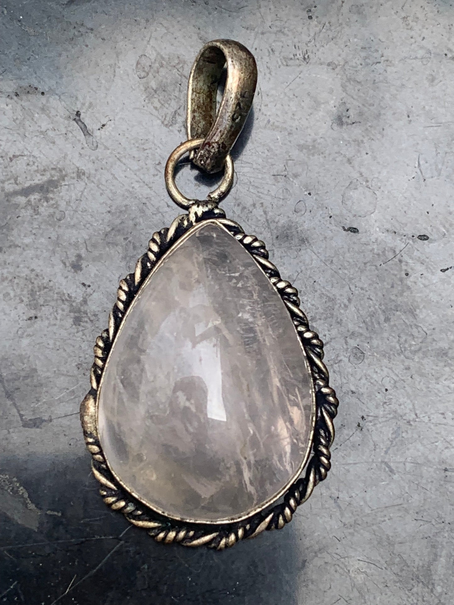 Rock crystal/Rose quartz! Pendant measuring 44mm high x 23mm wide x 12mm thick. Sold with an adjustable black cord!