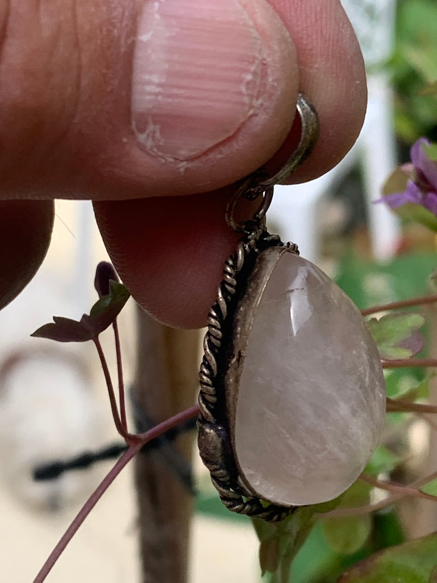 Rock crystal/Rose quartz! Pendant measuring 44mm high x 23mm wide x 12mm thick. Sold with an adjustable black cord!