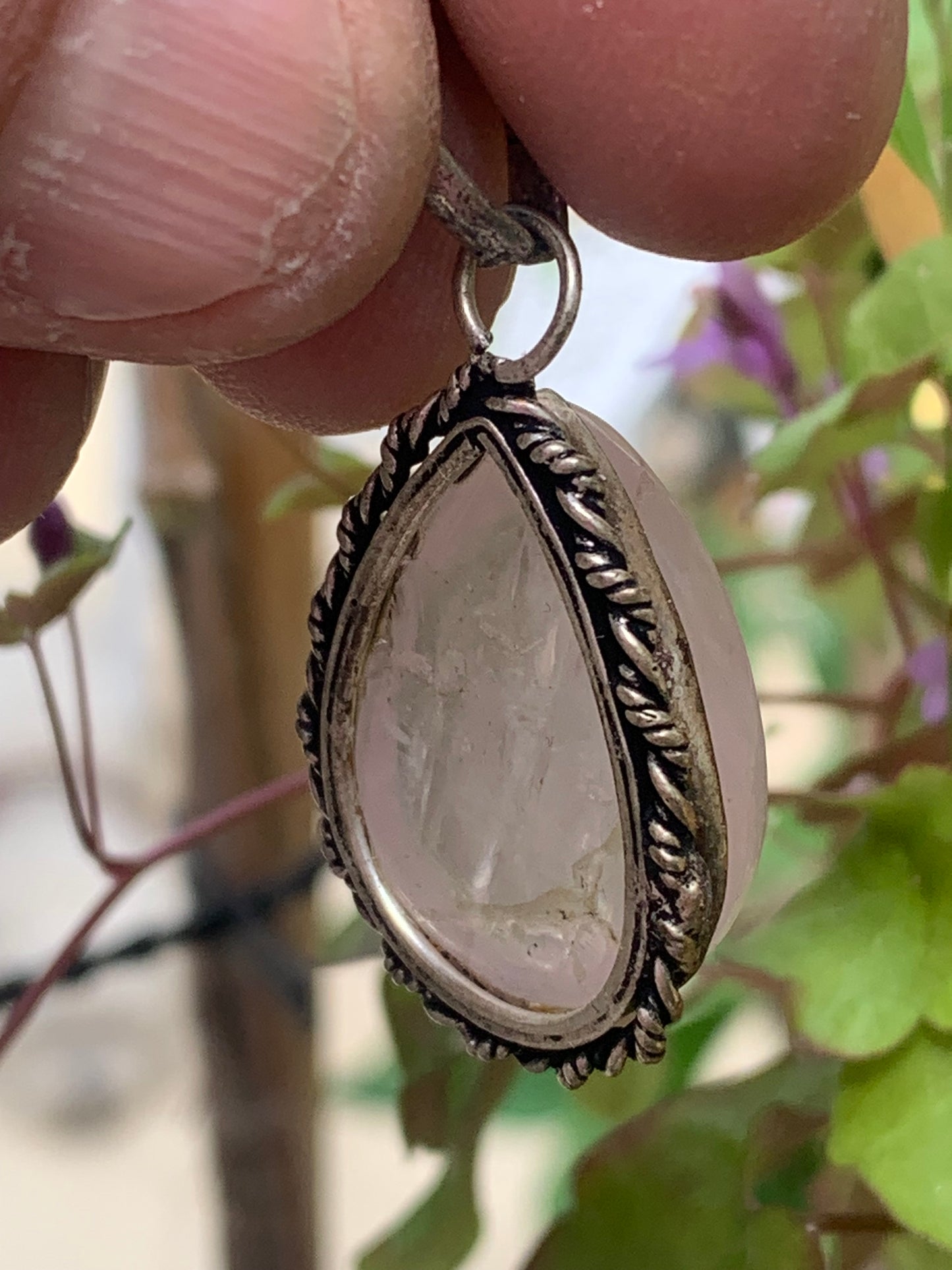 Rock crystal/Rose quartz! Pendant measuring 44mm high x 23mm wide x 12mm thick. Sold with an adjustable black cord!