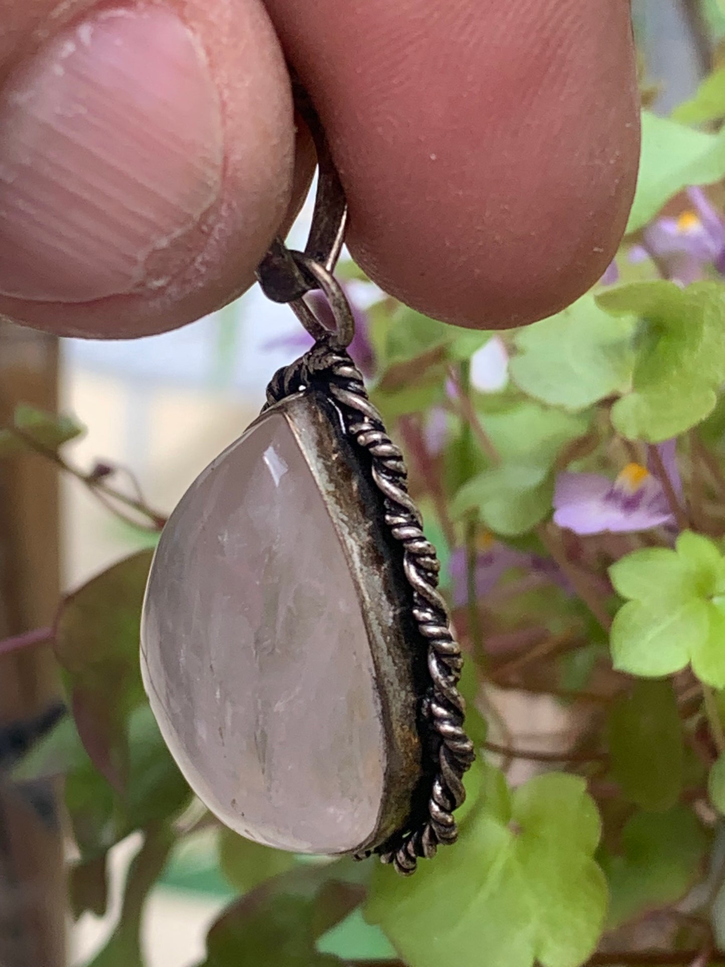 Rock crystal/Rose quartz! Pendant measuring 44mm high x 23mm wide x 12mm thick. Sold with an adjustable black cord!