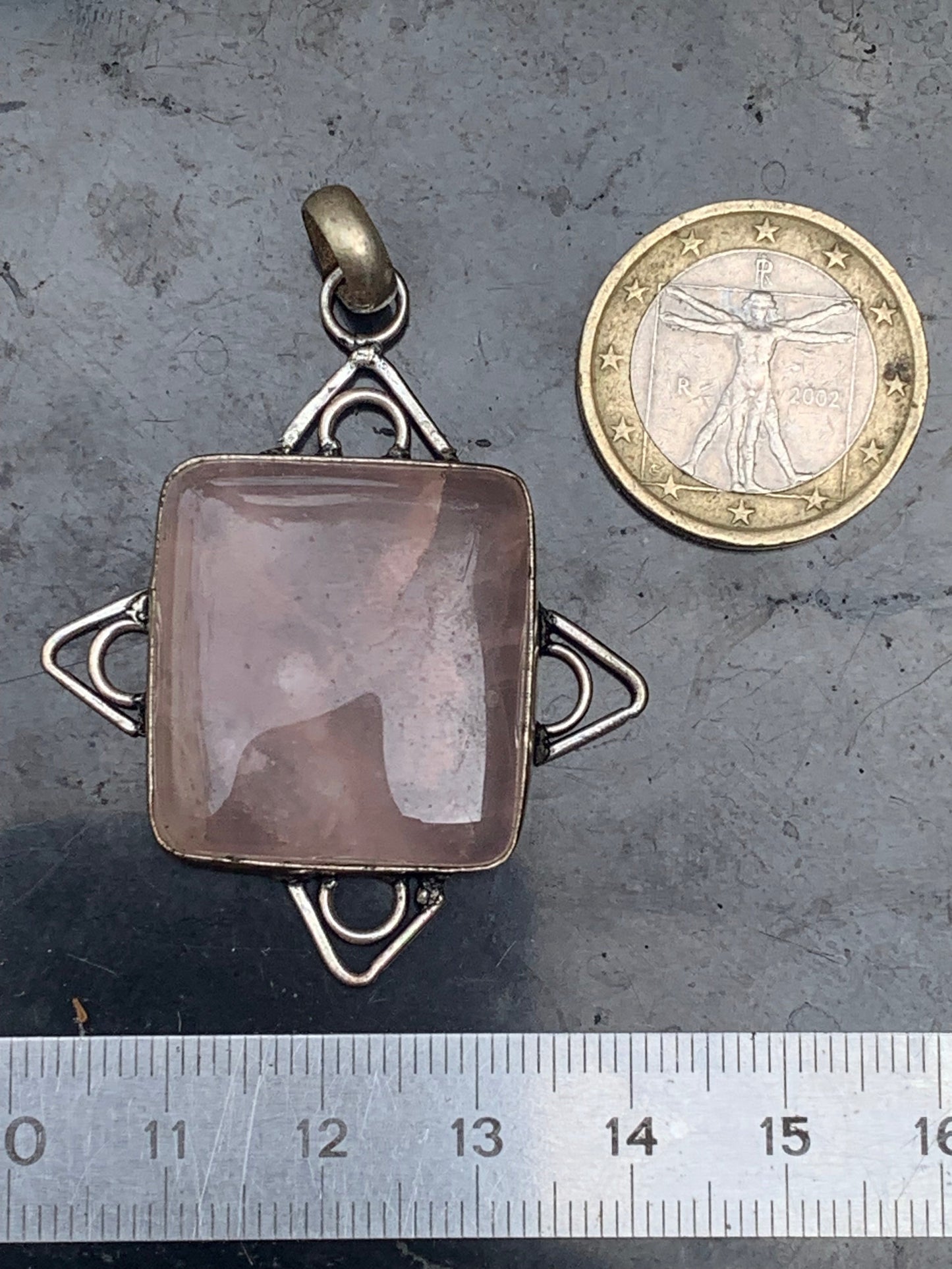 Rock crystal/Rose quartz! Pendant measuring 56mm high x 40mm wide x 8mm thick. Sold with an adjustable black cord!
