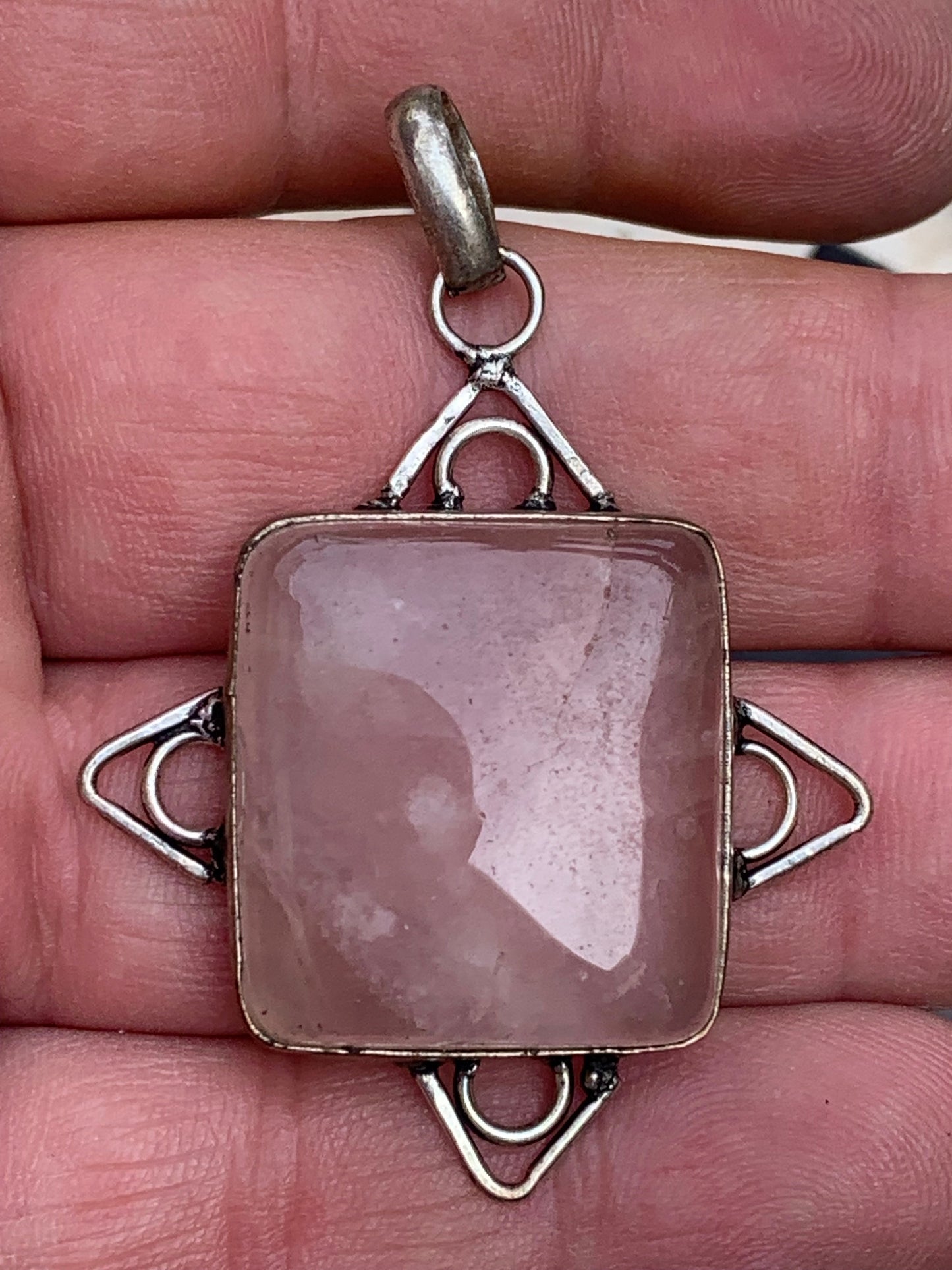 Rock crystal/Rose quartz! Pendant measuring 56mm high x 40mm wide x 8mm thick. Sold with an adjustable black cord!