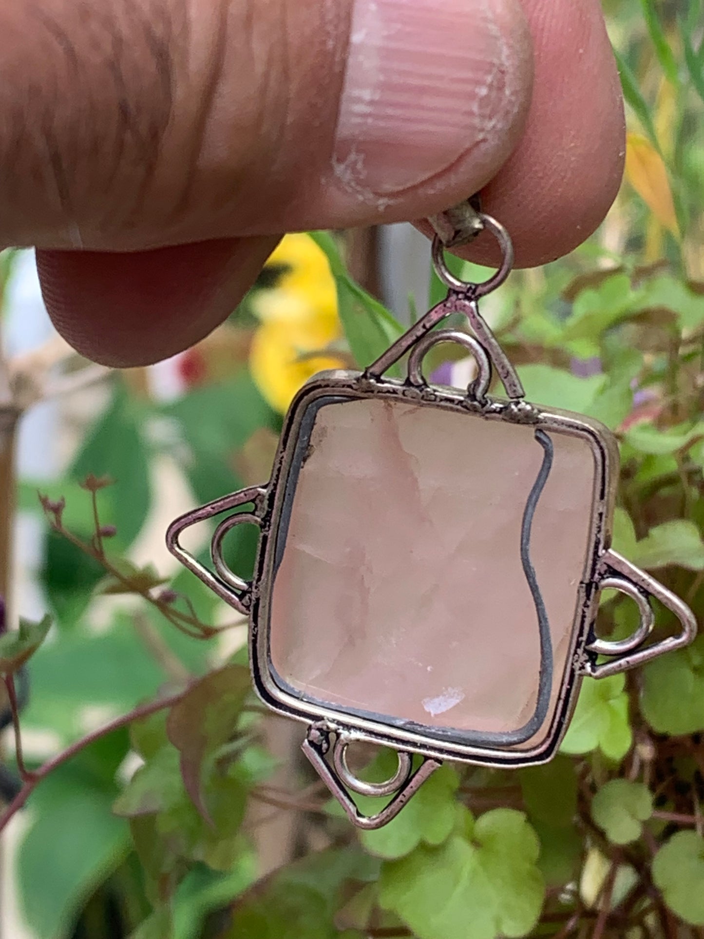 Rock crystal/Rose quartz! Pendant measuring 56mm high x 40mm wide x 8mm thick. Sold with an adjustable black cord!