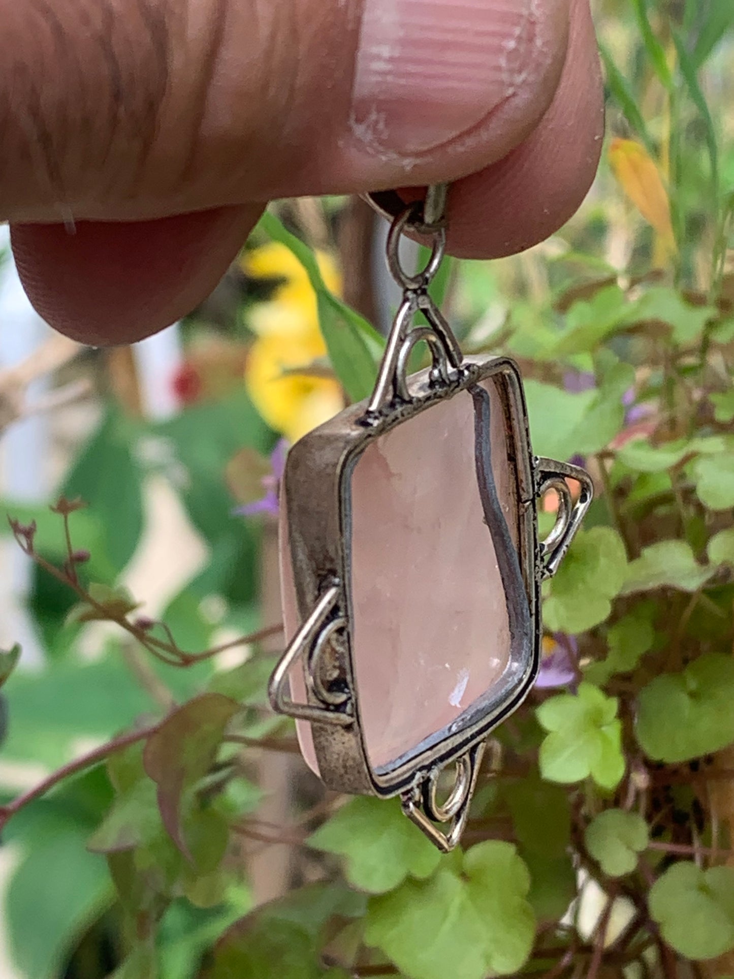 Rock crystal/Rose quartz! Pendant measuring 56mm high x 40mm wide x 8mm thick. Sold with an adjustable black cord!