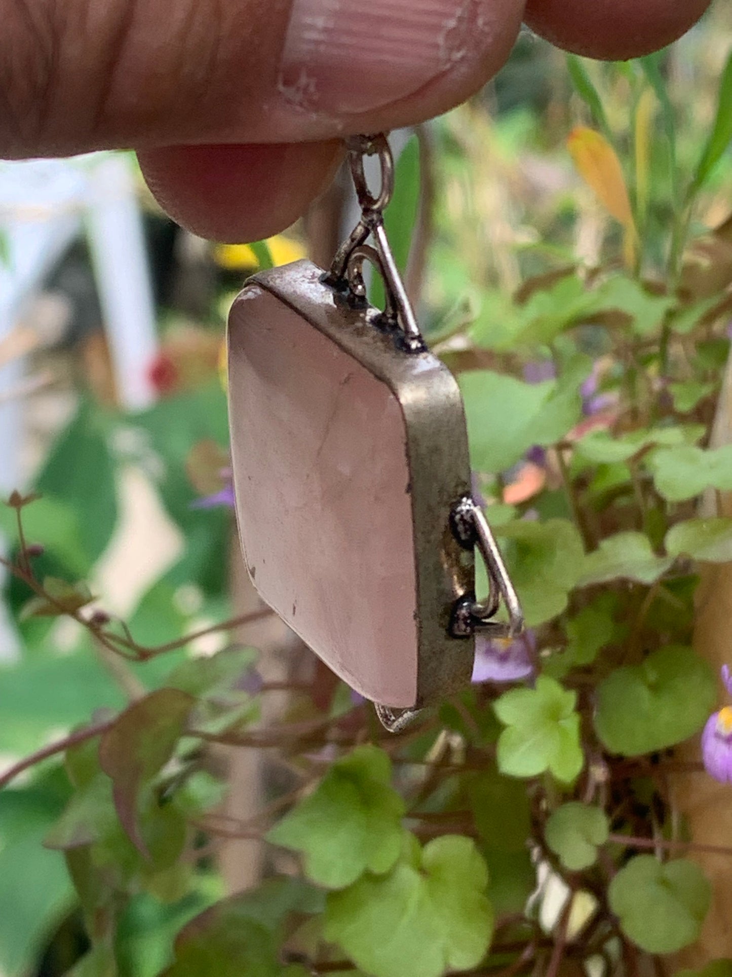 Rock crystal/Rose quartz! Pendant measuring 56mm high x 40mm wide x 8mm thick. Sold with an adjustable black cord!