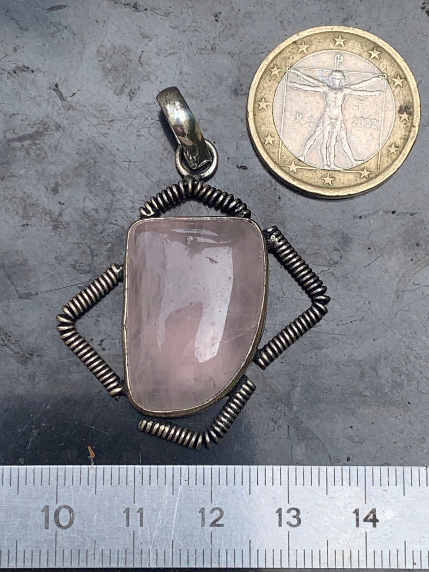 Rock crystal/Rose quartz! Pendant measuring 50mm high x 35mm wide x 10mm thick. Sold with an adjustable black cord!