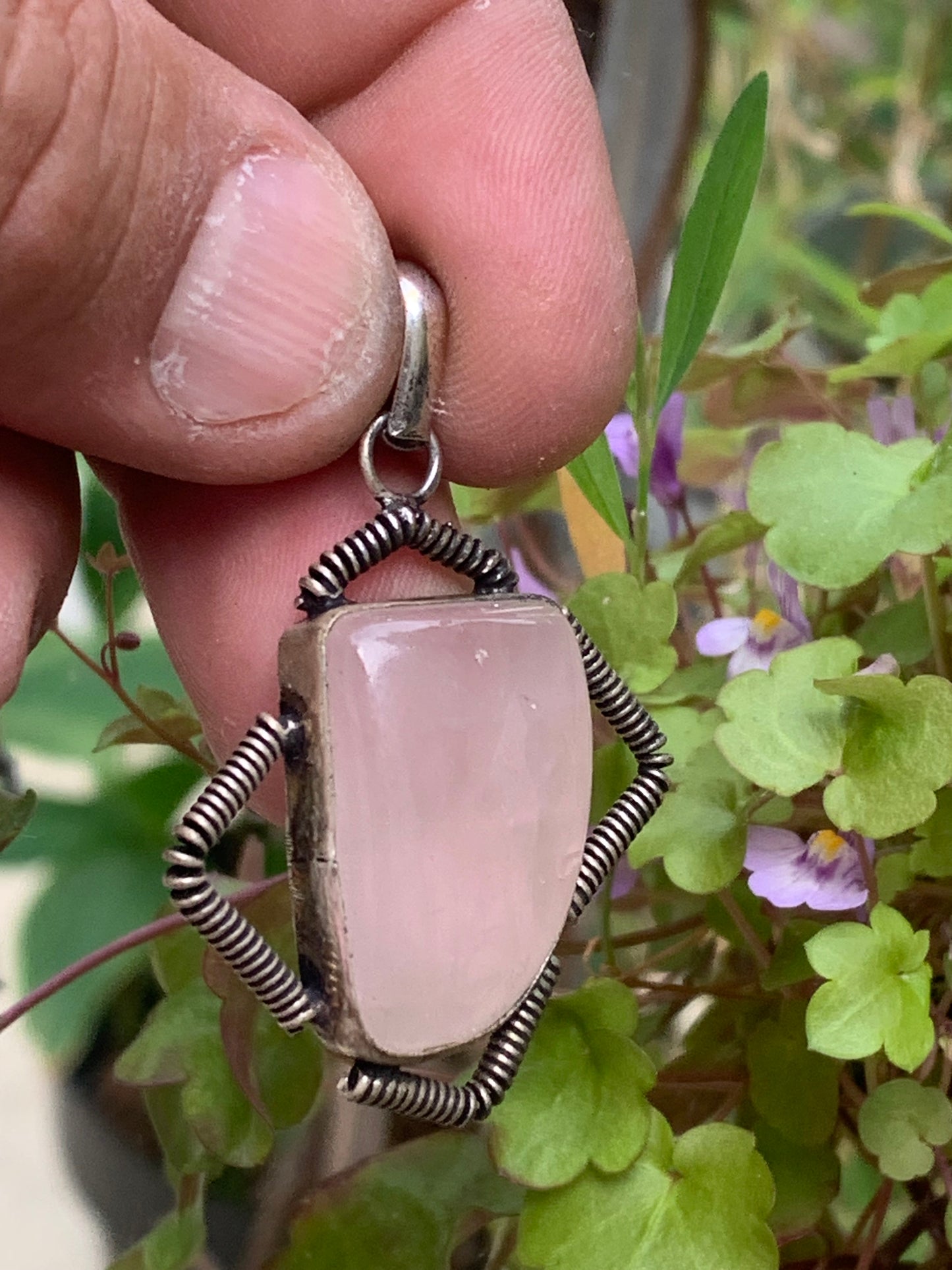 Rock crystal/Rose quartz! Pendant measuring 50mm high x 35mm wide x 10mm thick. Sold with an adjustable black cord!