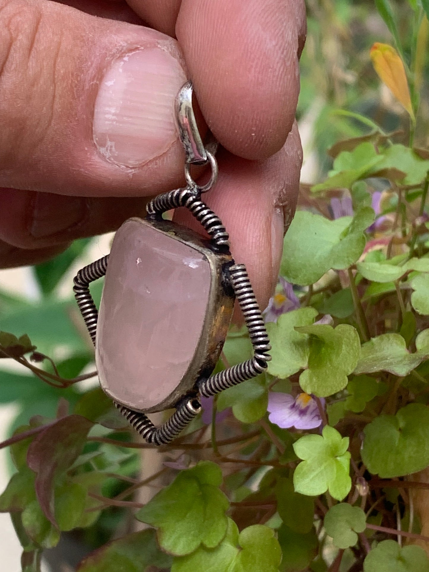 Rock crystal/Rose quartz! Pendant measuring 50mm high x 35mm wide x 10mm thick. Sold with an adjustable black cord!