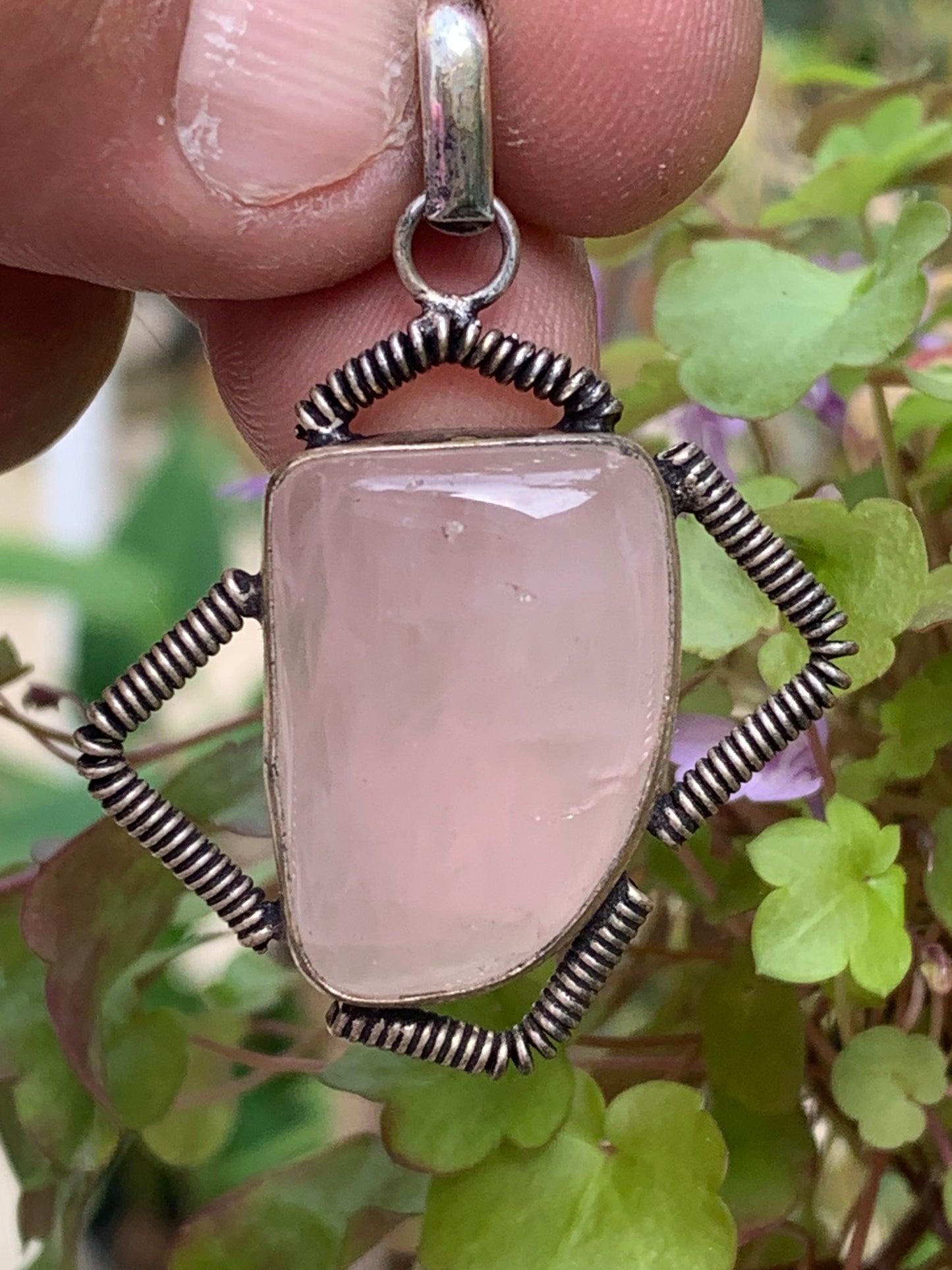 Rock crystal/Rose quartz! Pendant measuring 50mm high x 35mm wide x 10mm thick. Sold with an adjustable black cord!