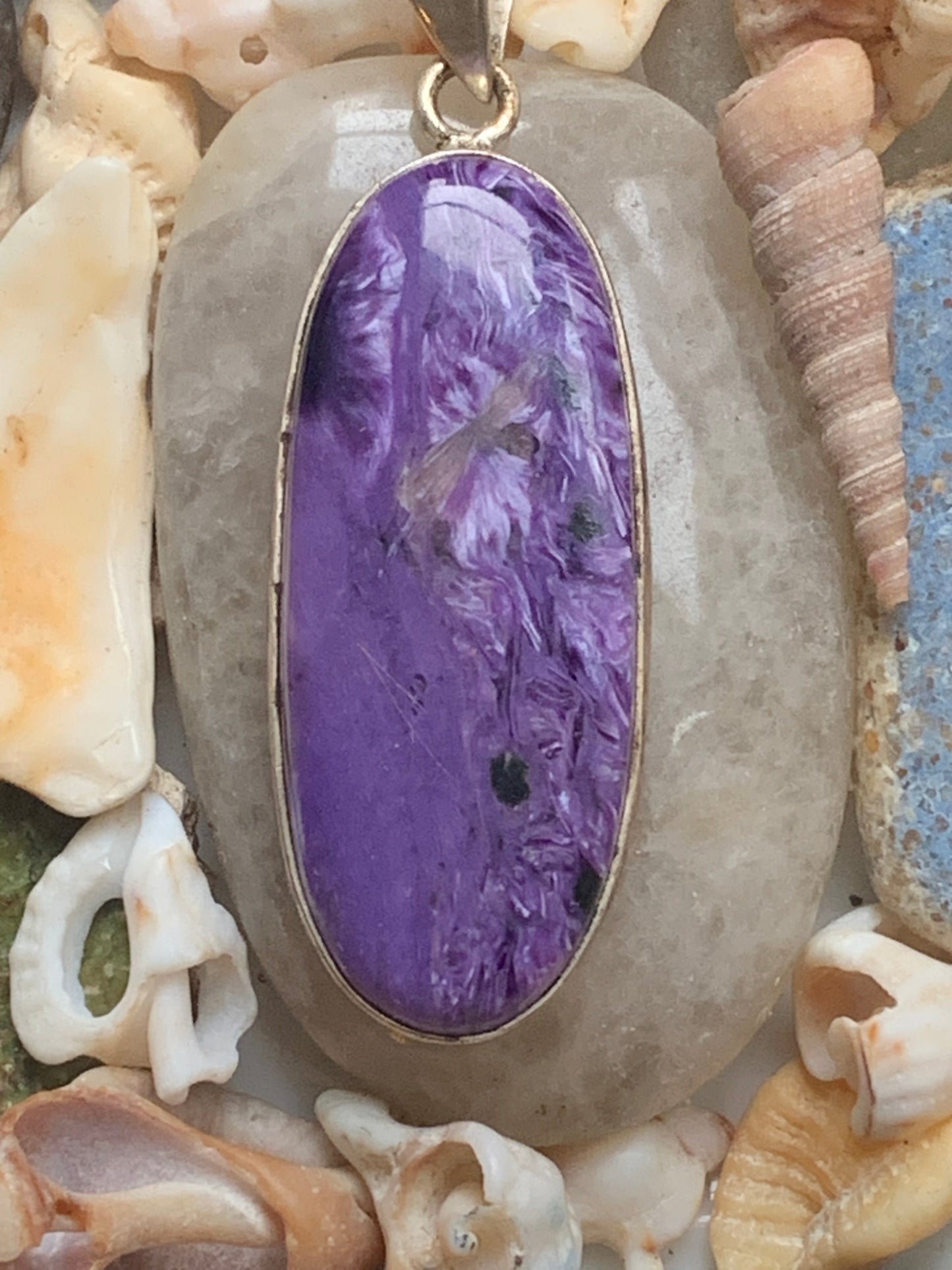 Charoite, magnificent pendant in 925 Silver, 52mm high x 18 wide x 8 thick. Sold with an adjustable black cord!