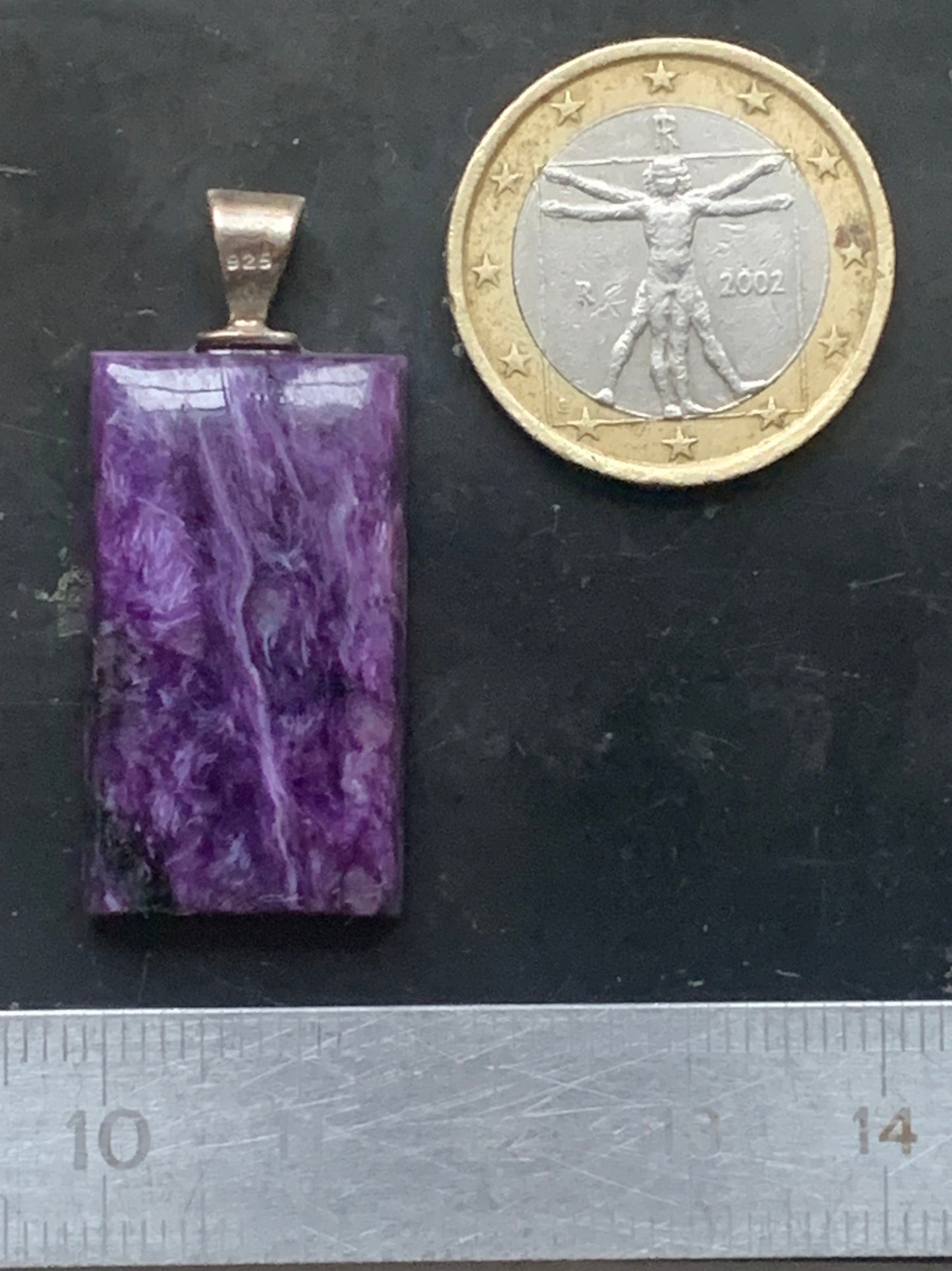 Charoite, magnificent pendant in 925 Silver, 37mm high x 16 wide x 7 thick. Sold with an adjustable black cord!