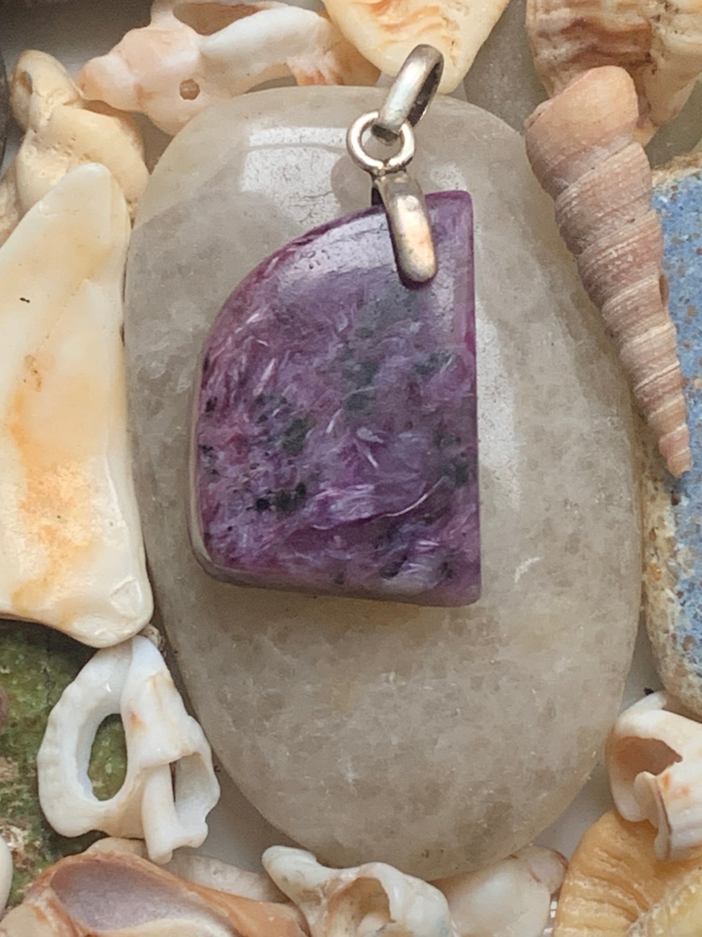 Charoite, magnificent 925 Silver pendant, 35mm high x 18mm wide x 7mm thick. Sold with an adjustable black cord!
