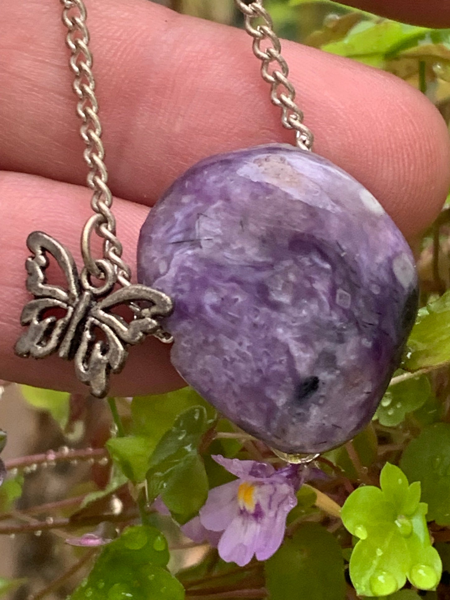 Charoite, 925 Silver pendant, 27mm high x 21mm wide x 10mm thick. Sold with an adjustable black cord!