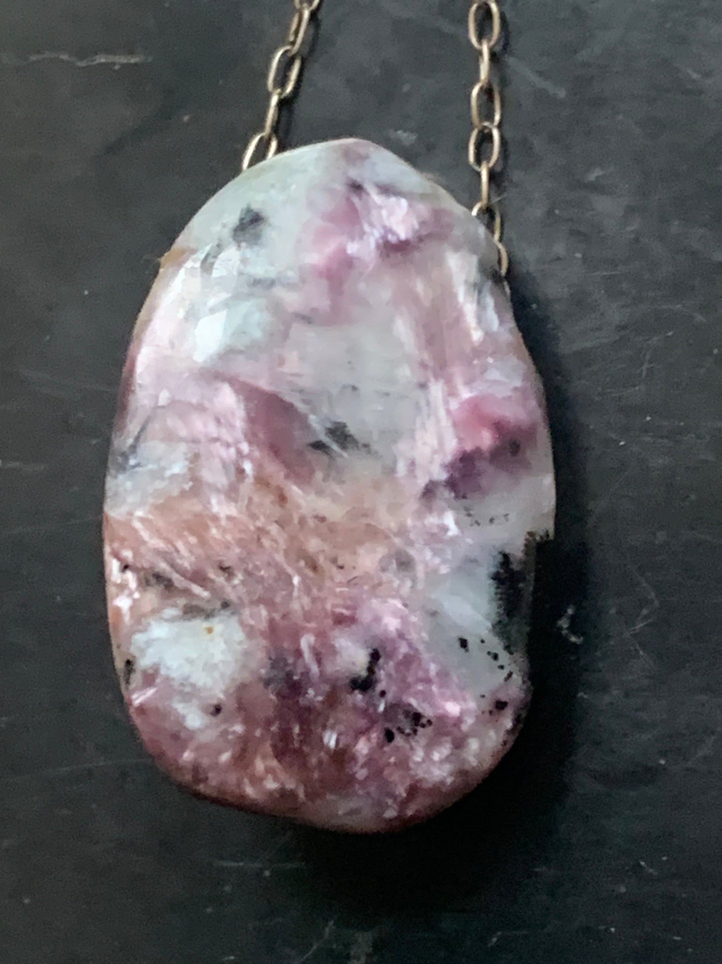 Charoite, 925 Silver pendant, 25mm high x 16mm wide x 10mm thick. Sold with an adjustable black cord!