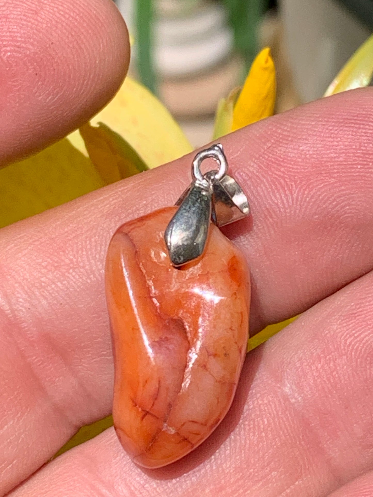 Carnelian pendant made by Gem & Zen, 35mm high x 14mm wide x 10mm thick. Sold with adjustable black cord!