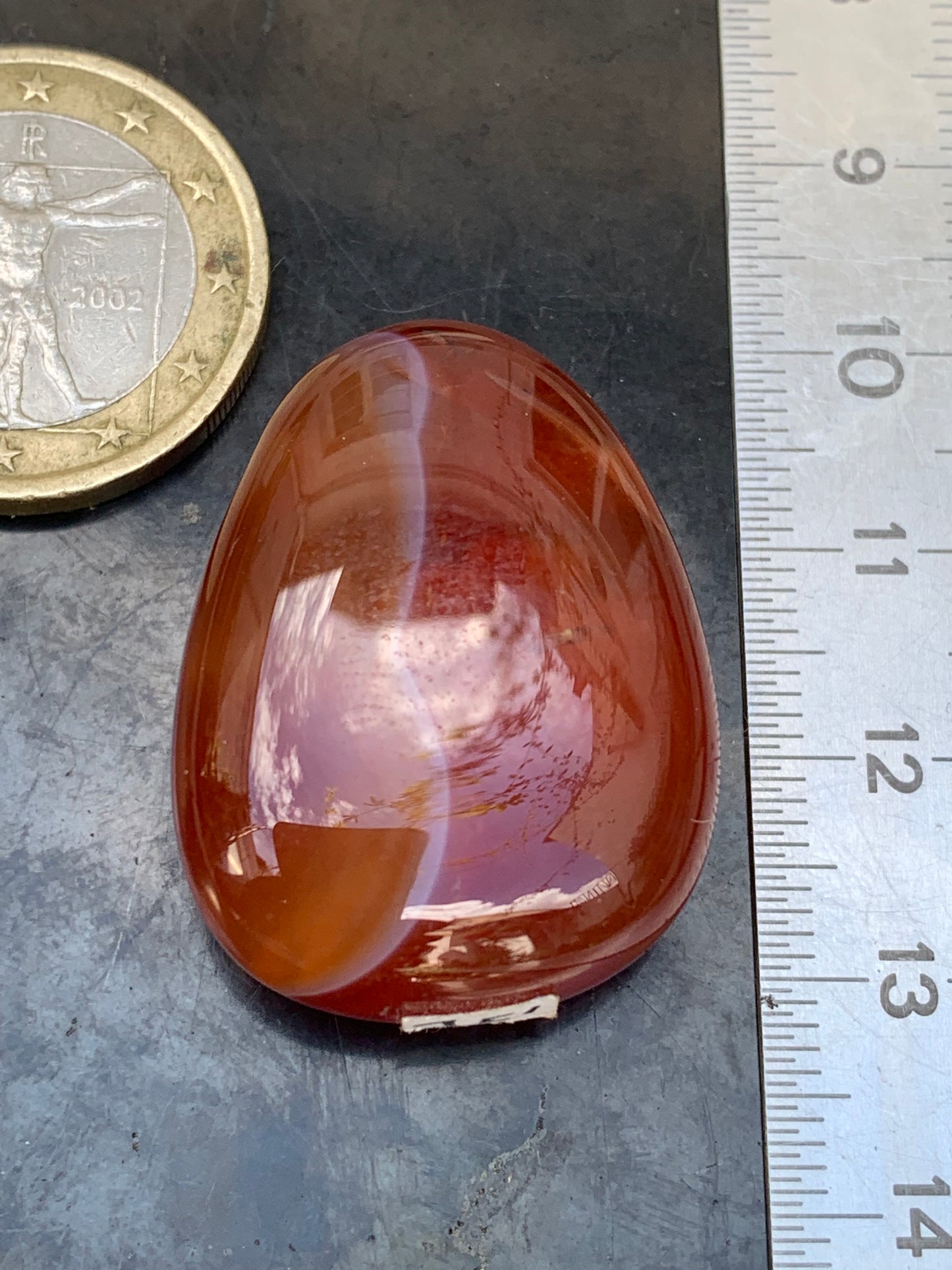 Carnelian, pendant measuring 31mm high x 23mm wide x 12mm thick. Sold with an adjustable black cord!