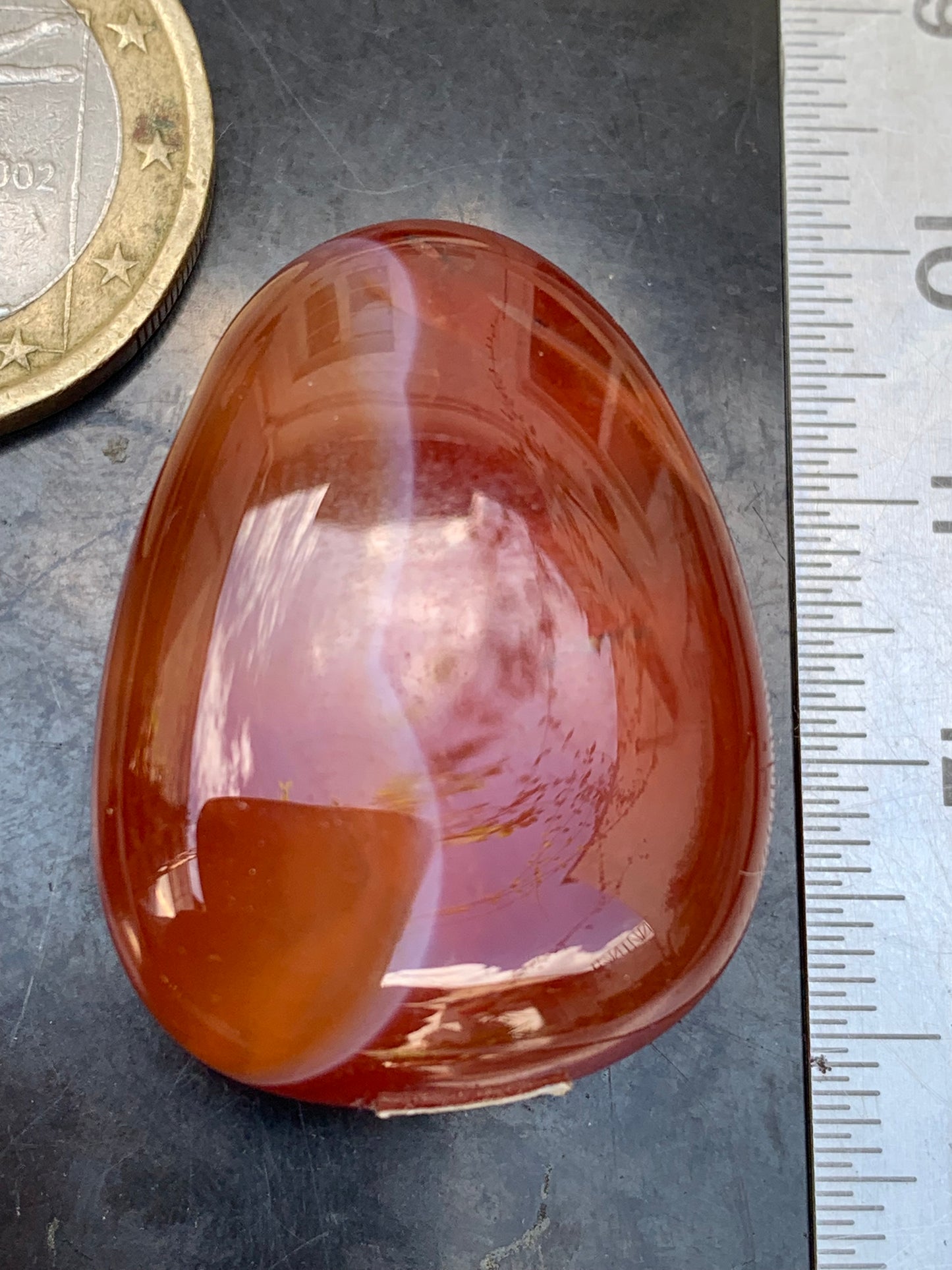 Carnelian, pendant measuring 31mm high x 23mm wide x 12mm thick. Sold with an adjustable black cord!