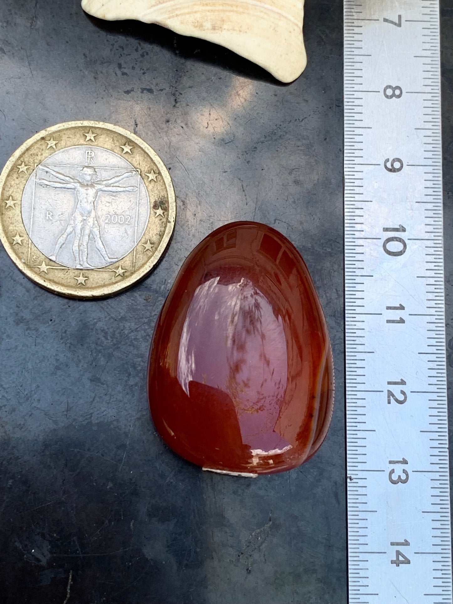 Carnelian, pendant measuring 31mm high x 23mm wide x 12mm thick. Sold with an adjustable black cord!