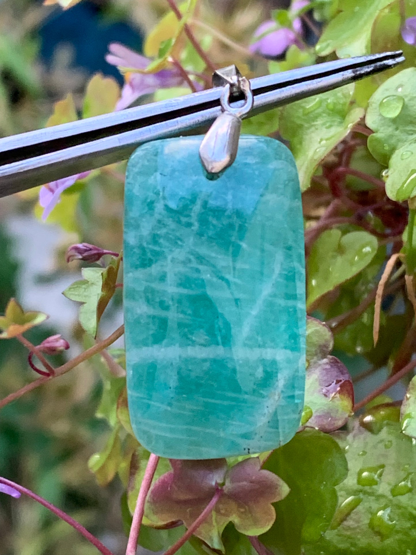 Amazonite, pendant measuring 42mm high x 18mm wide x 8mm thick. Sold with a free adjustable black cord!
