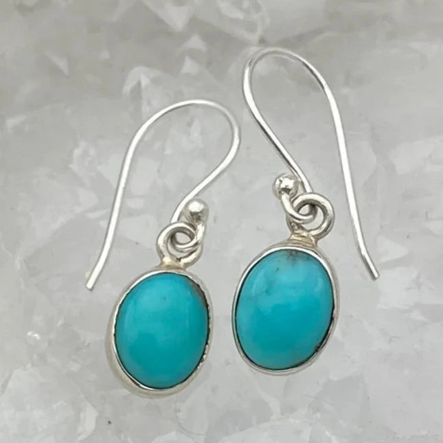 Boucles d'oreilles en Turquoise , cabochon sertis de forme ovale, qualité AA à AAA. Vendu en finition Argent, parfait !