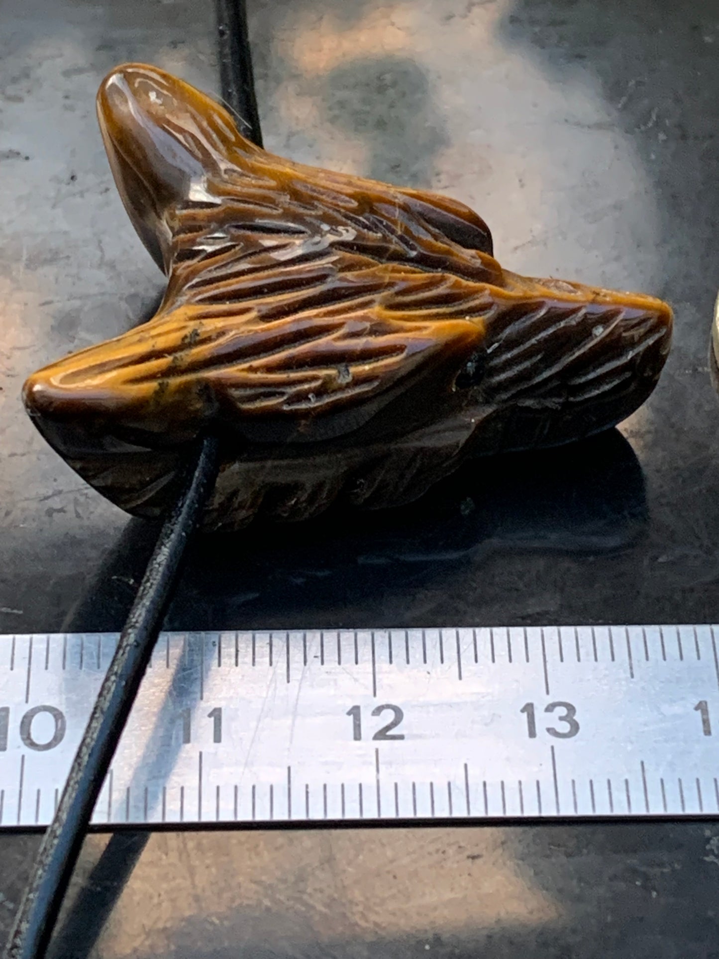 Tiger's Eye, 'Wolf Head' pendant, 38mm high x 30 wide x 15 thick, made in France. Sold with a free adjustable black cord!