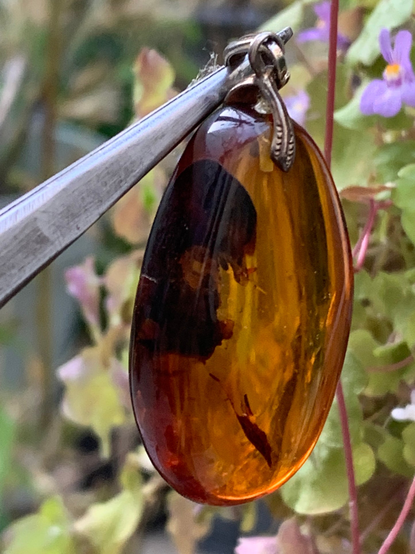 Amber, silver pendant, polished natural pebble measuring 50x22x15 millimeters, sold with a sliding (adjustable) black leather cord measuring 40 to 70 centimeters!