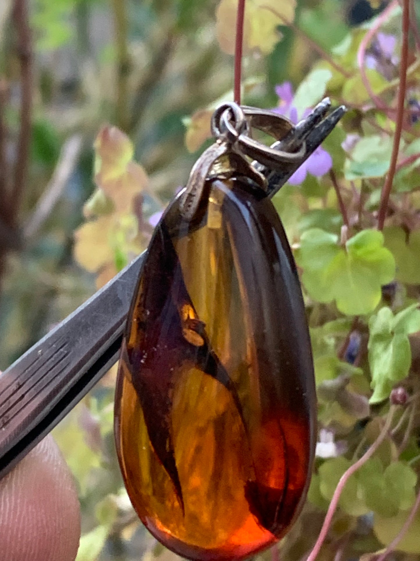 Amber, silver pendant, polished natural pebble measuring 50x22x15 millimeters, sold with a sliding (adjustable) black leather cord measuring 40 to 70 centimeters!
