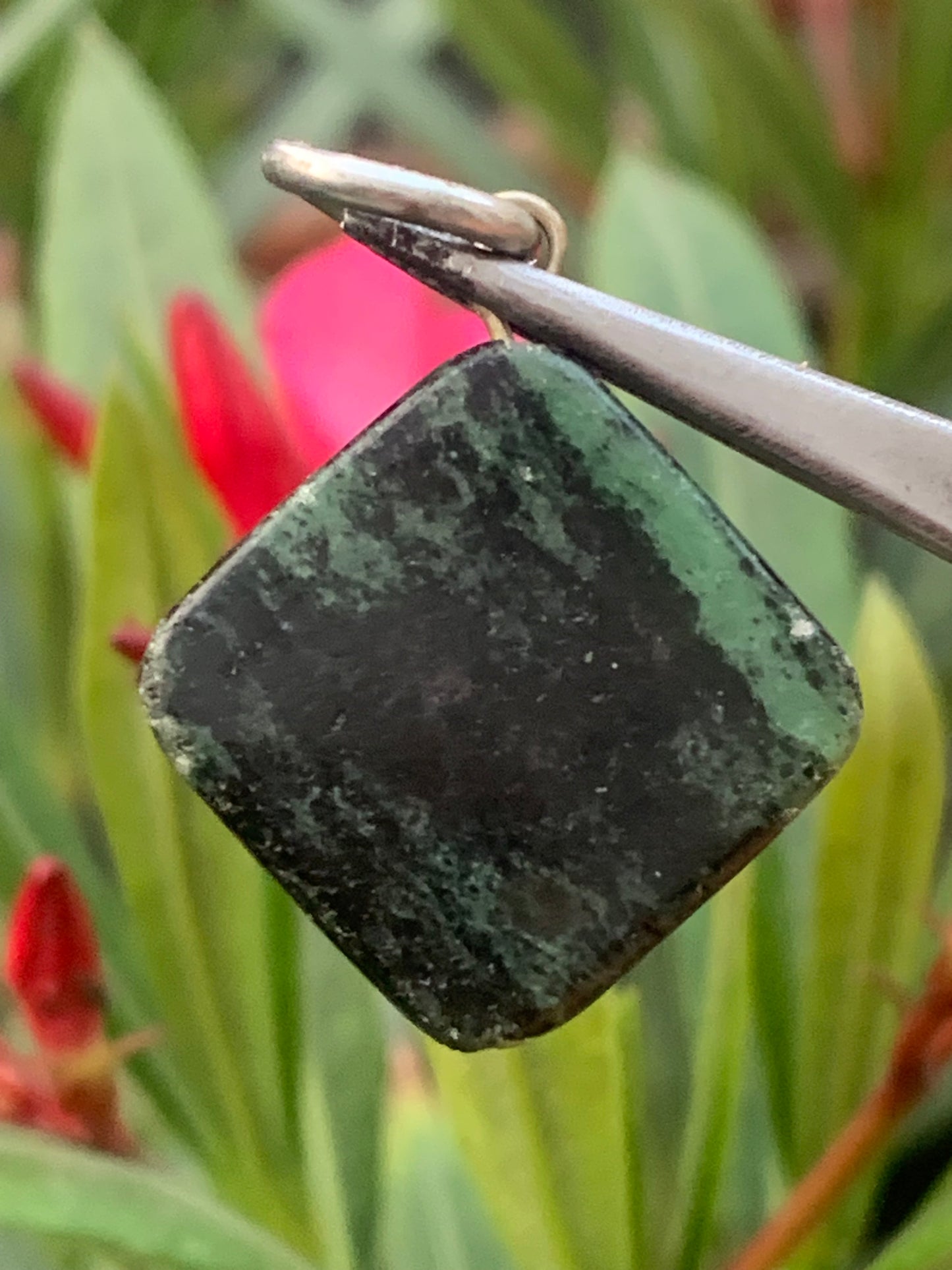 Zoisite pendant mounted by G & Z, 37 mm high x 25 x 5. Sold with an adjustable black cord!