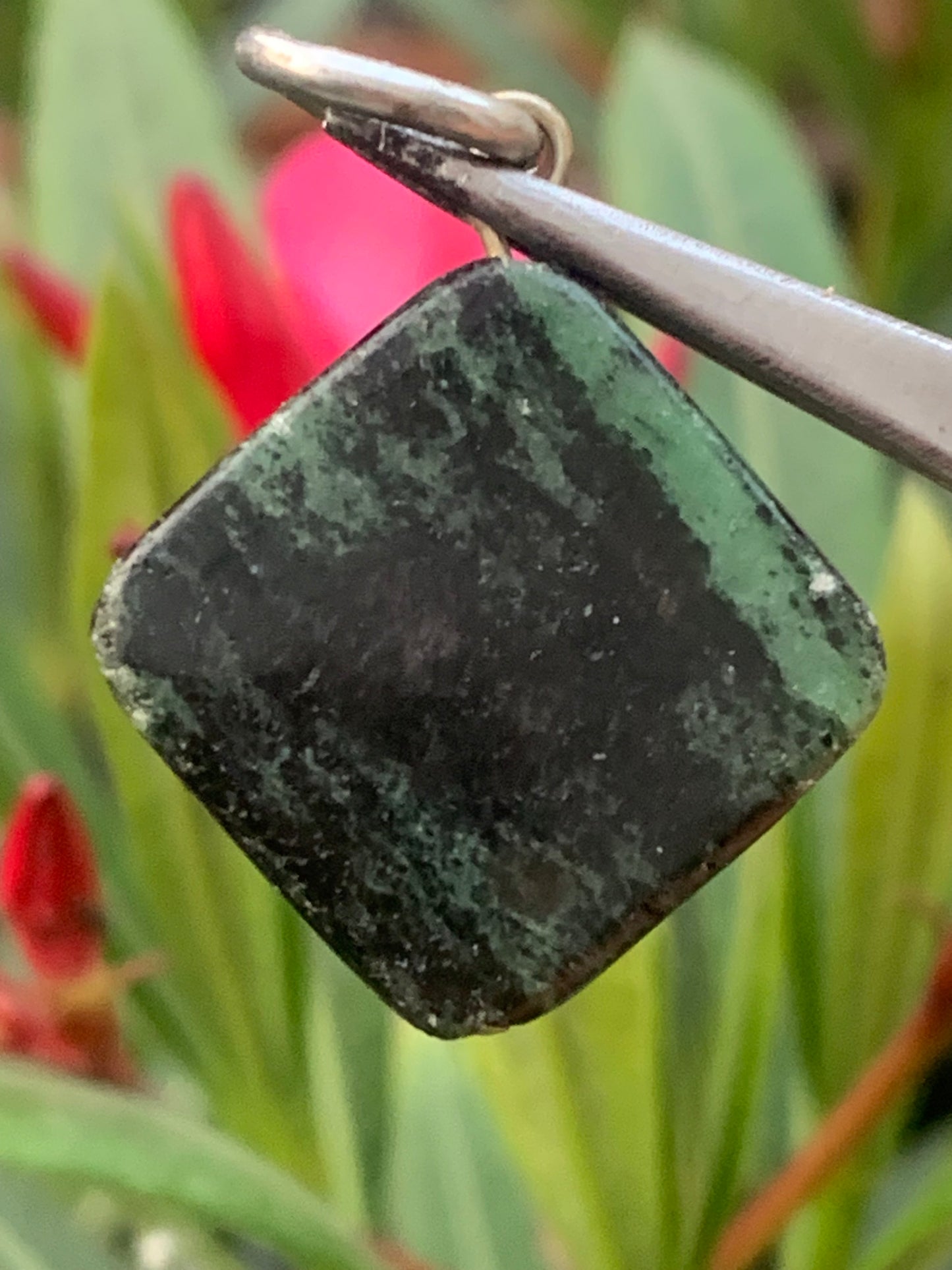 Zoisite pendant mounted by G & Z, 37 mm high x 25 x 5. Sold with an adjustable black cord!