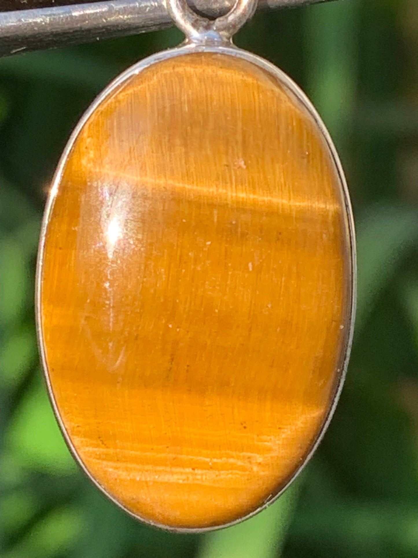 Tiger's Eye, Silver pendant, 44mm high x 20mm wide x 8mm thick. Sold with adjustable cord!