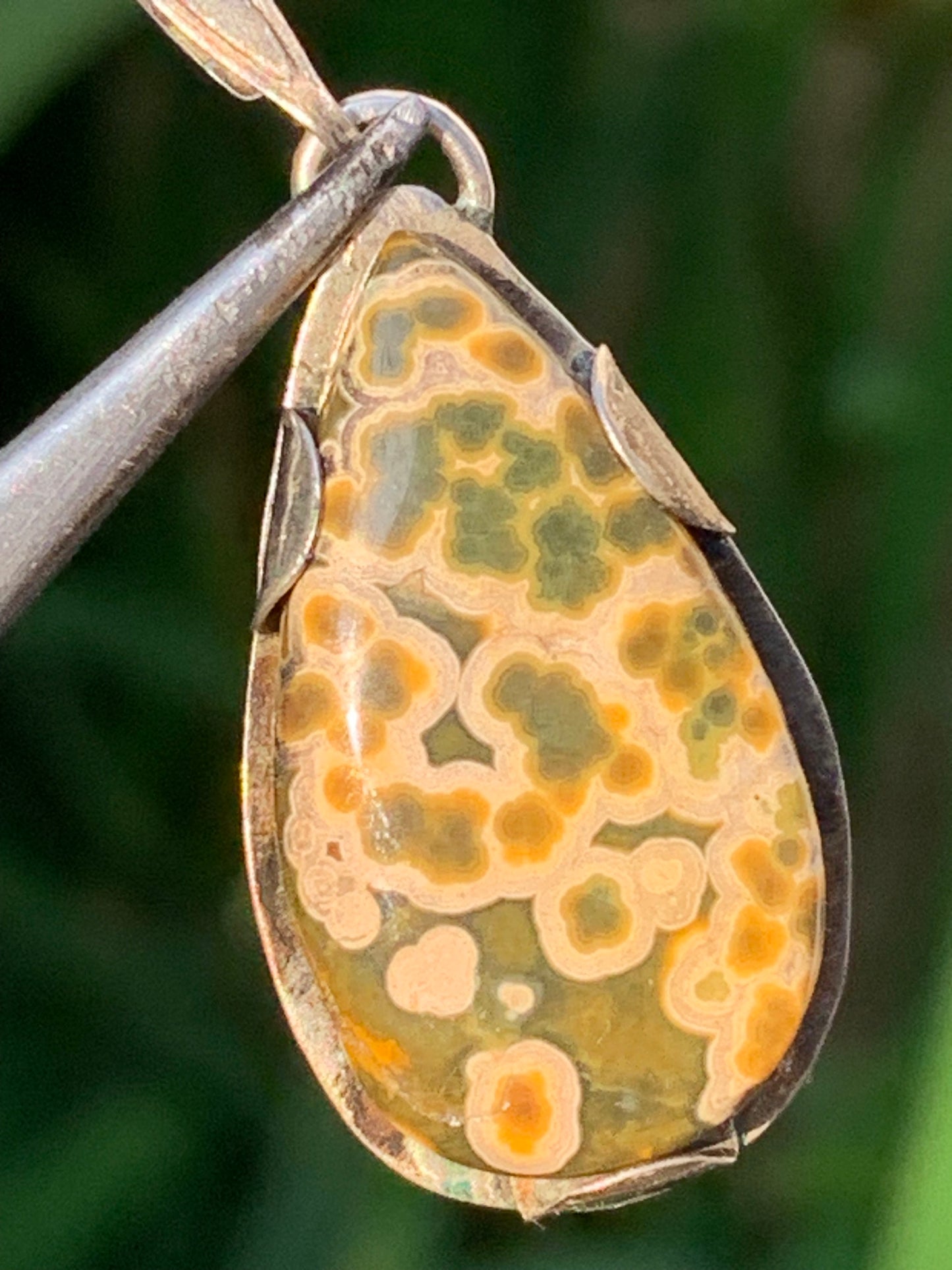 Orbicular Jasper, Silver pendant, 35mm high x 15mm wide x 5mm thick. Sold with adjustable cord!