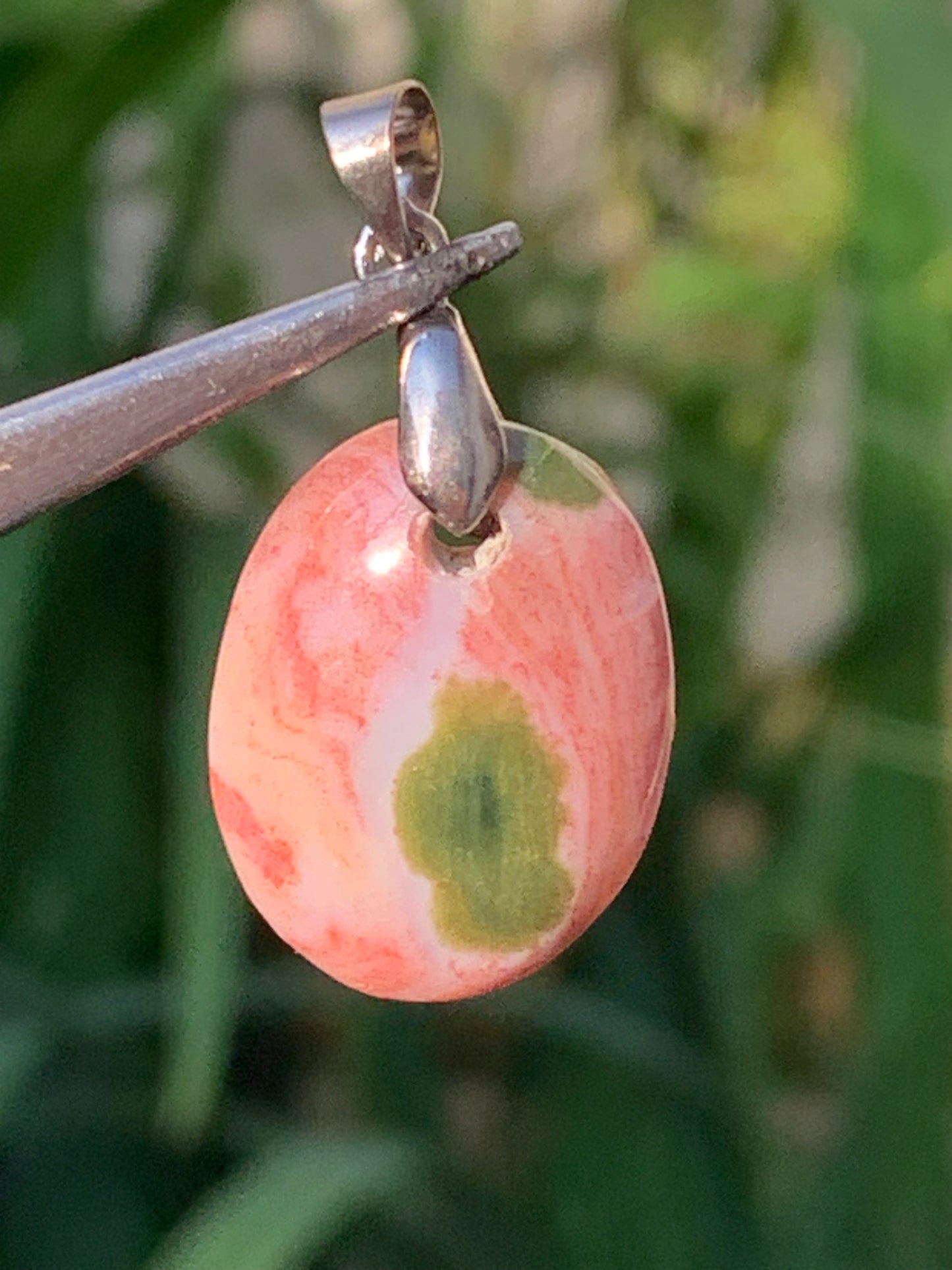 Orbicular Jasper, Silver pendant, 32mm high x 16mm wide x 5mm thick. Sold with adjustable cord!