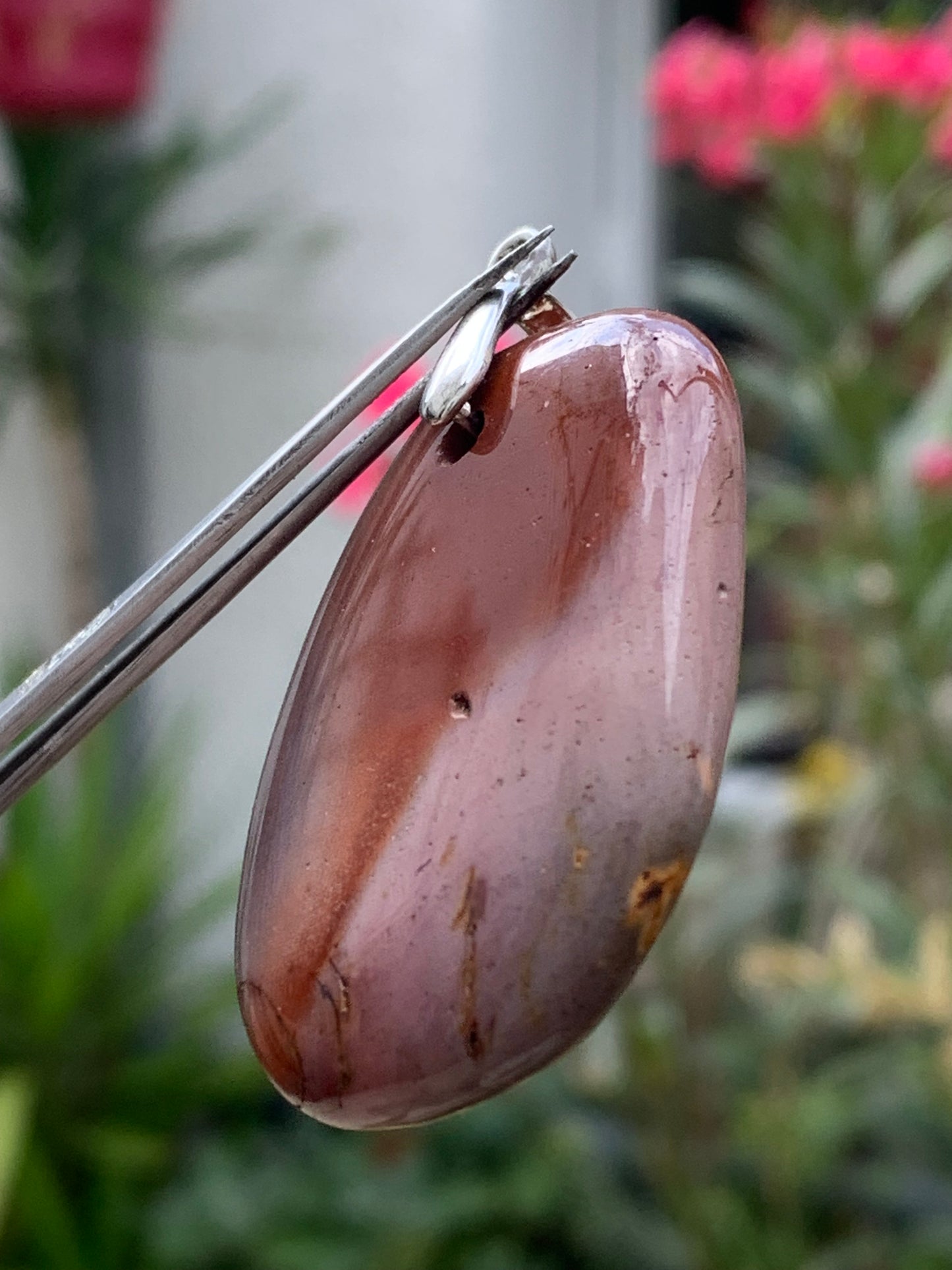 Polychrome jasper, pendant measuring 44mm high x 32mm wide x 10mm deep. Sold with an adjustable black cord!