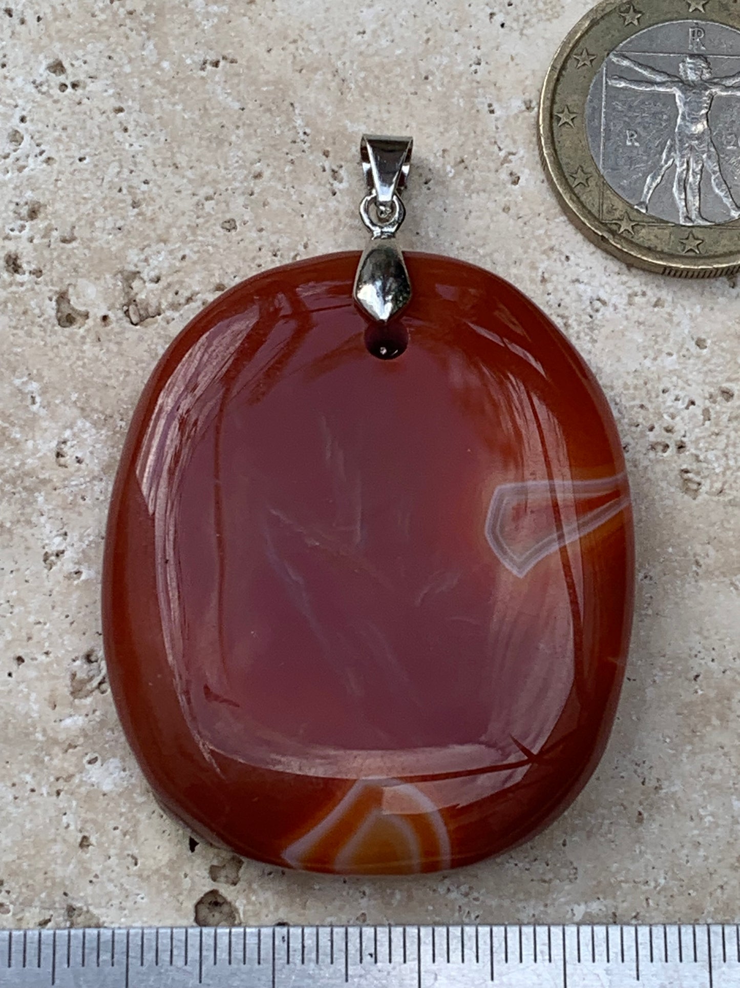 Carnelian, pendant measuring 55mm high x 38mm wide x 9mm thick. Sold with an adjustable black cord!