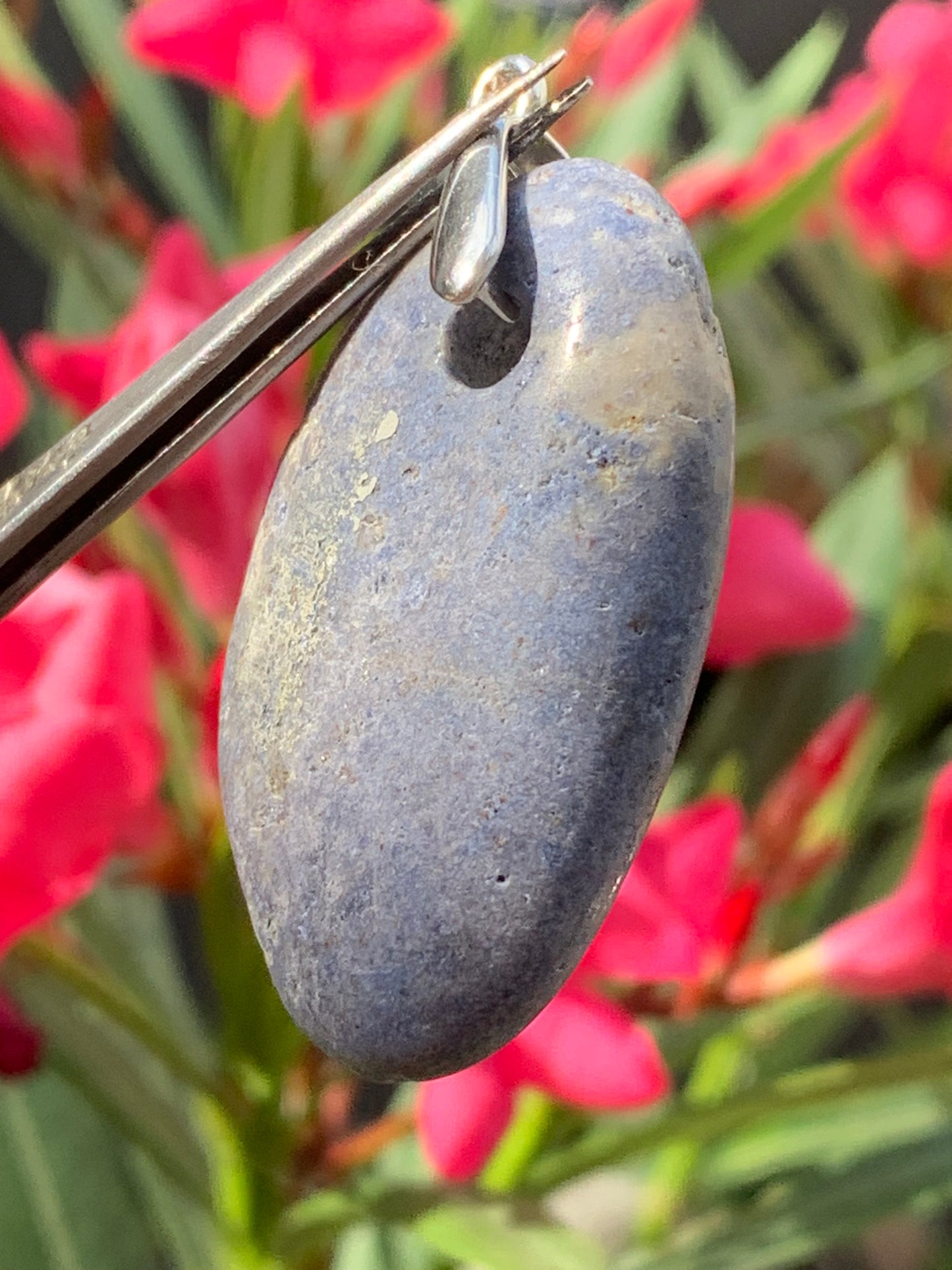 Dumortierite, pendant measuring 45mm high x30 x10. Sold with an adjustable black cord!