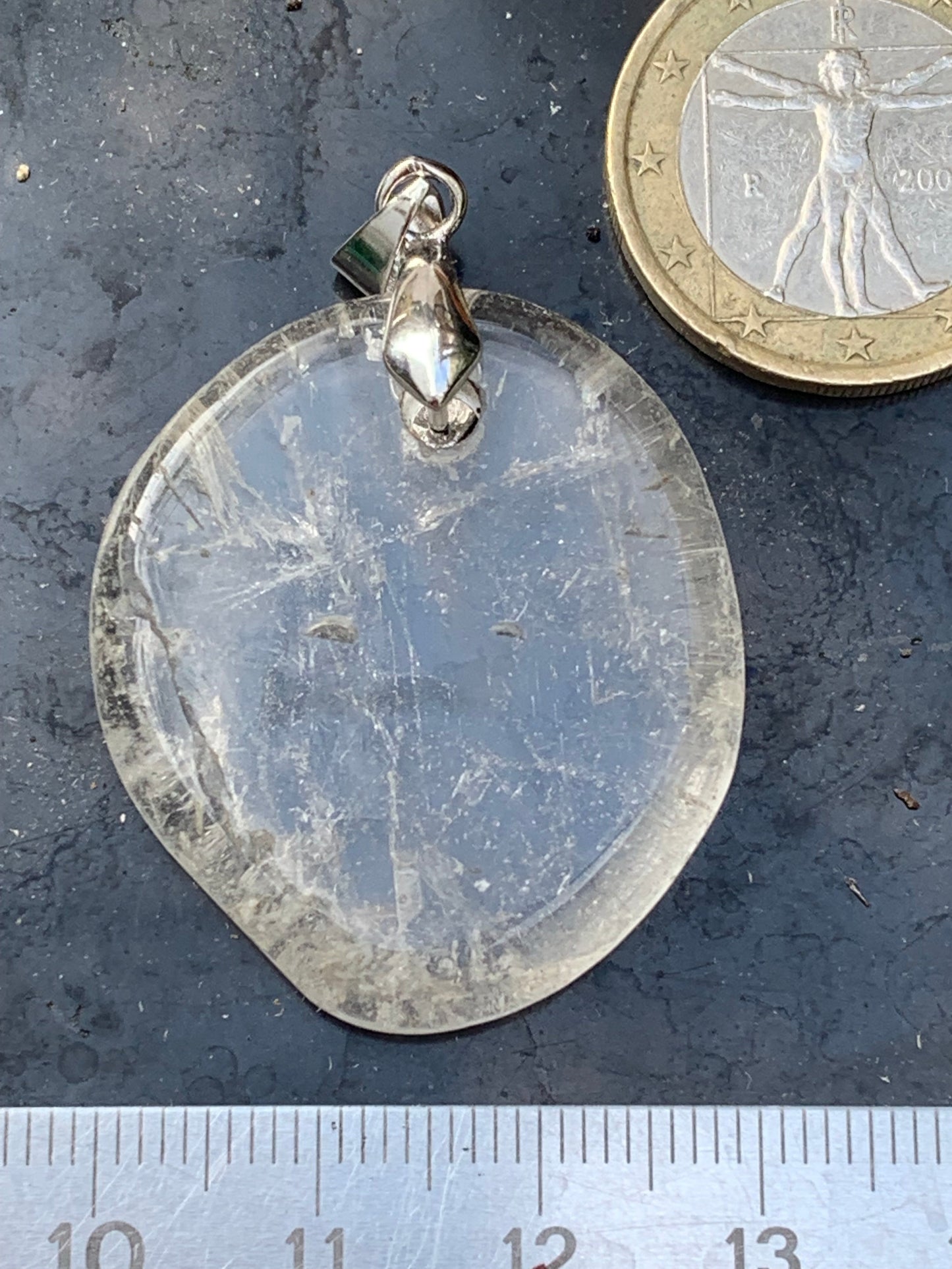 Rock crystal/Quartz, pendant measuring 45mm high x 30mm wide x 7mm thick. Sold with an adjustable black cord!