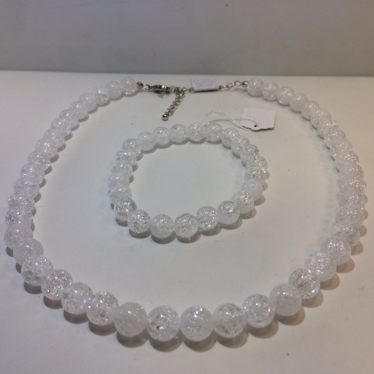 Cristal de roche 'Craquelé' ou 'Neige' (Quartz), perles rondes de 4, 6, 8, 10, 12, 14 mm. Vendu en fil de perle 38/39 cm, en bracelet de 17 à 21 cm, en collier de 45 ou sautoir de 60 cm !