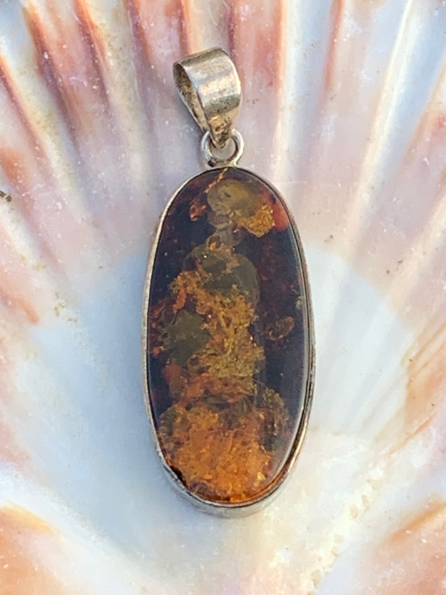 Amber, silver pendant measuring 52 x 18 x 6 mm / 6.3 grams, sold with a sliding black cord measuring 40 to 70 cm!