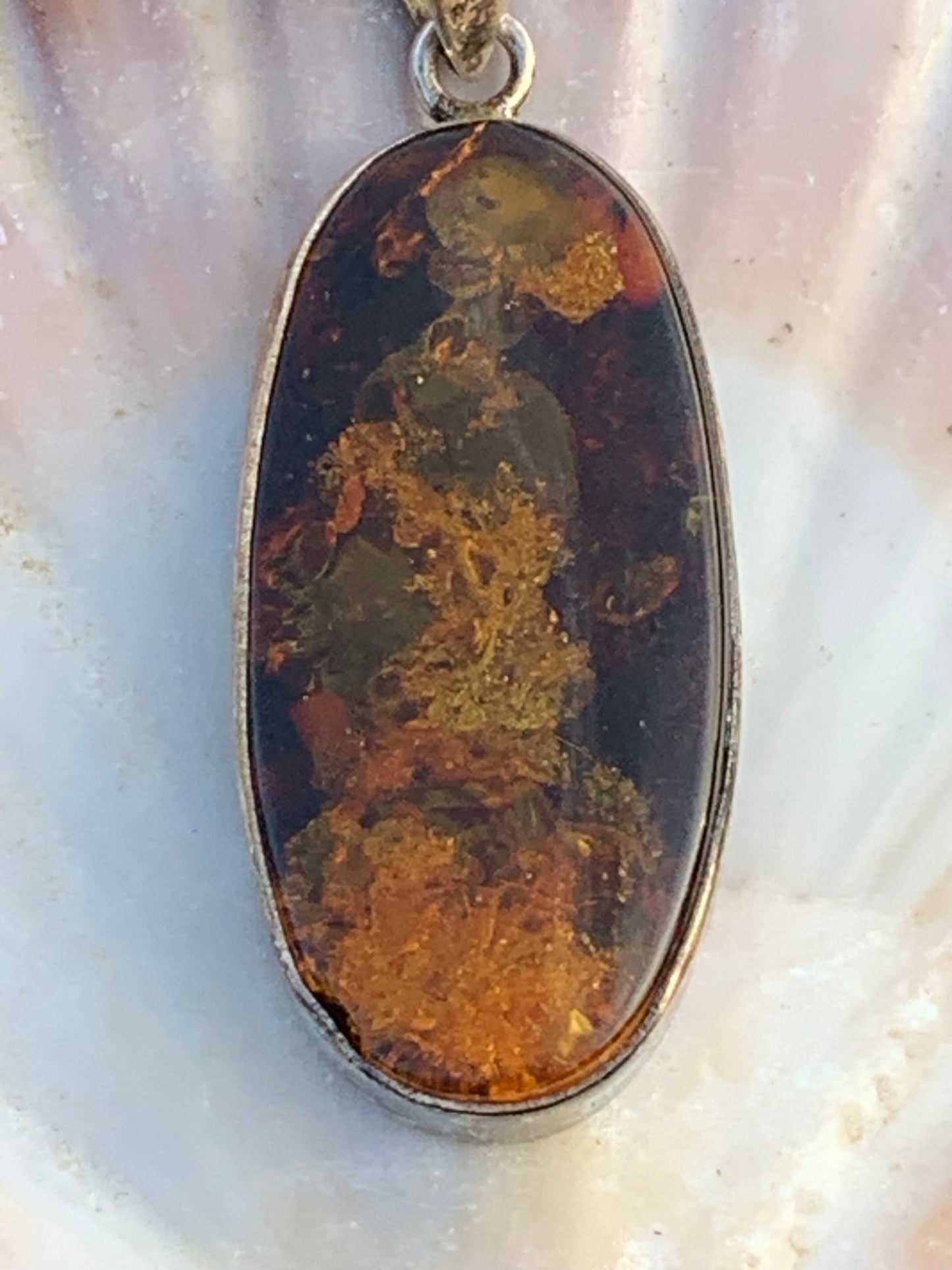 Amber, silver pendant measuring 52 x 18 x 6 mm / 6.3 grams, sold with a sliding black cord measuring 40 to 70 cm!