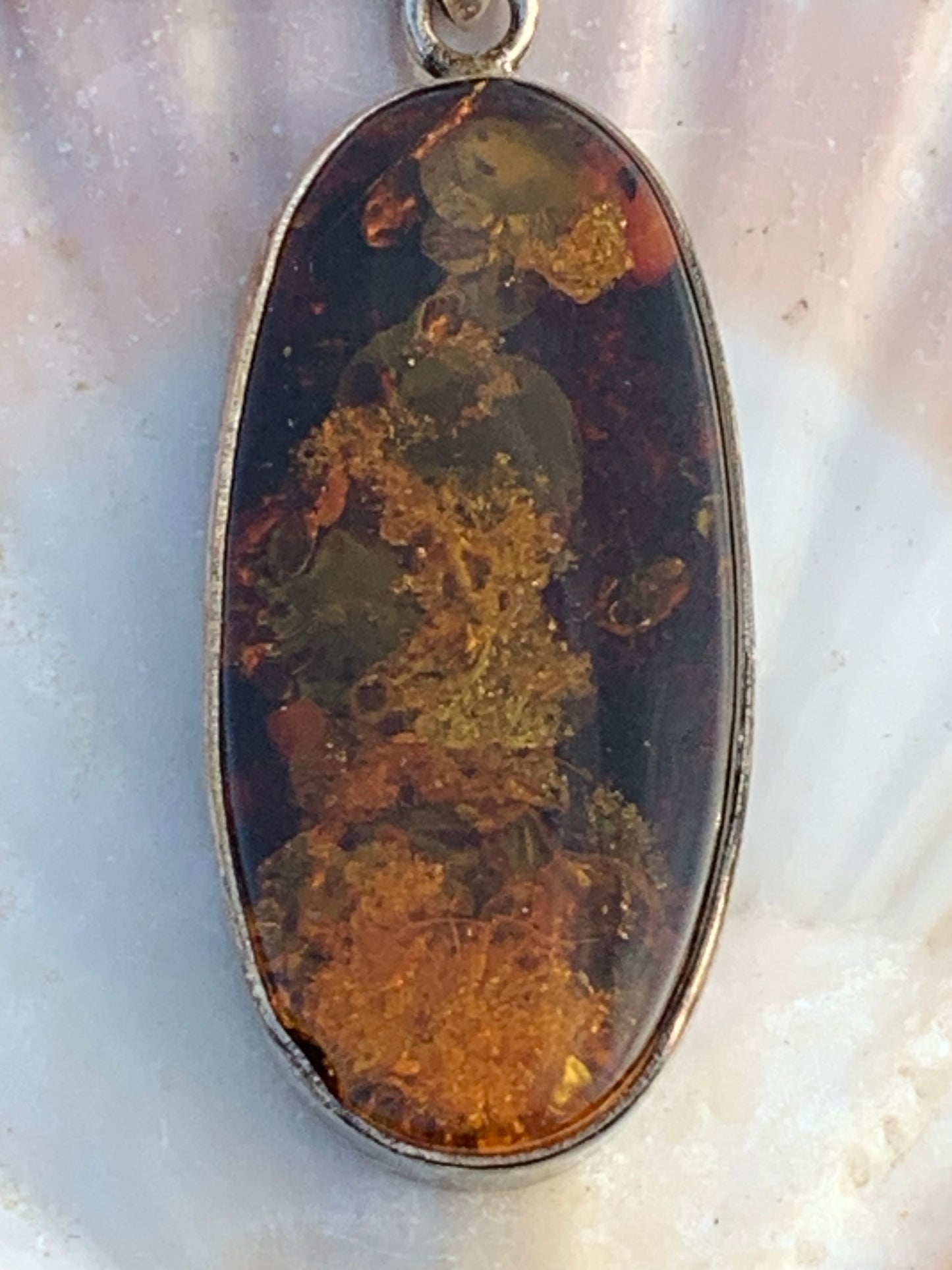 Amber, silver pendant measuring 52 x 18 x 6 mm / 6.3 grams, sold with a sliding black cord measuring 40 to 70 cm!