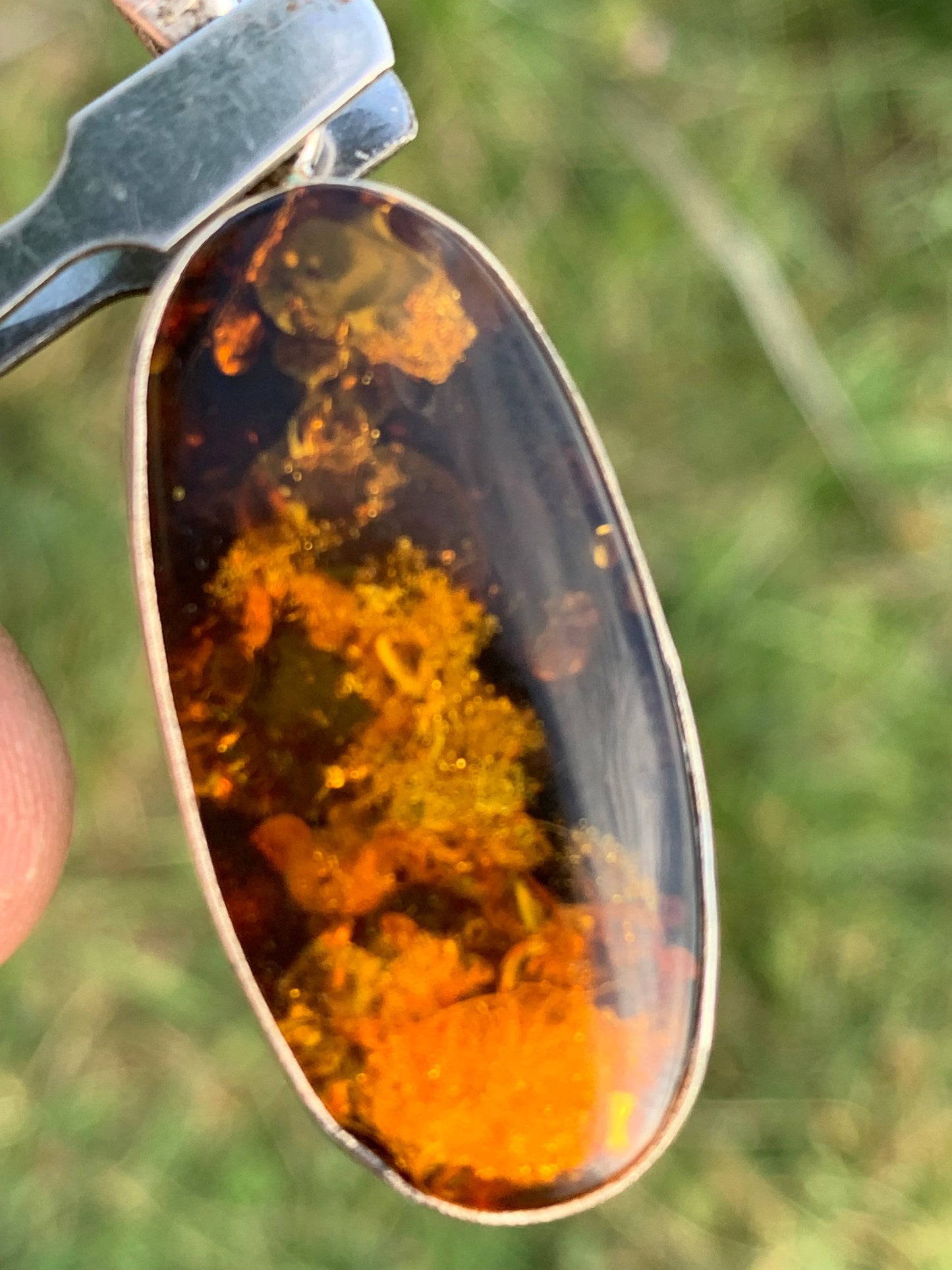 Amber, silver pendant measuring 52 x 18 x 6 mm / 6.3 grams, sold with a sliding black cord measuring 40 to 70 cm!