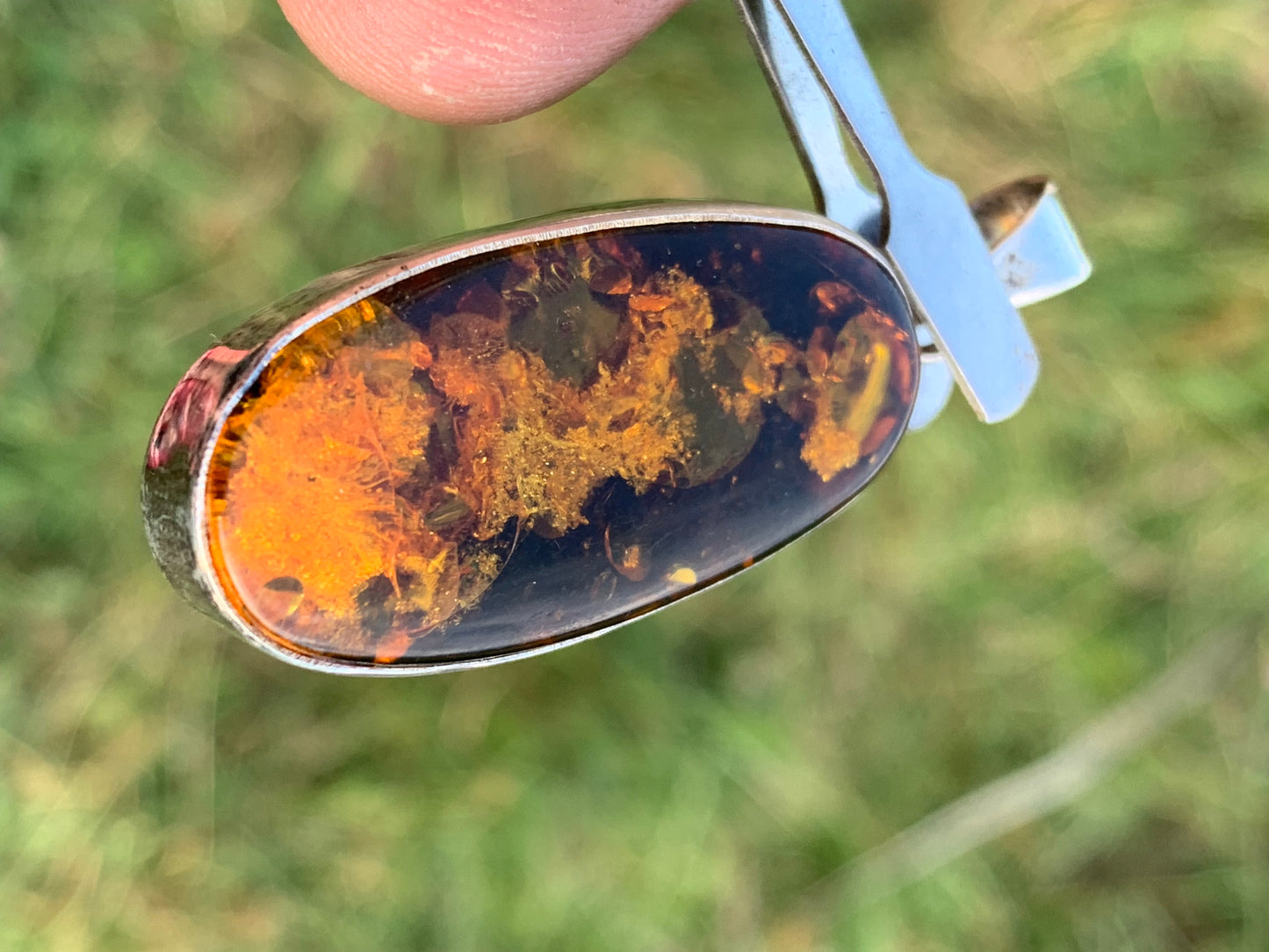 Amber, silver pendant measuring 52 x 18 x 6 mm / 6.3 grams, sold with a sliding black cord measuring 40 to 70 cm!