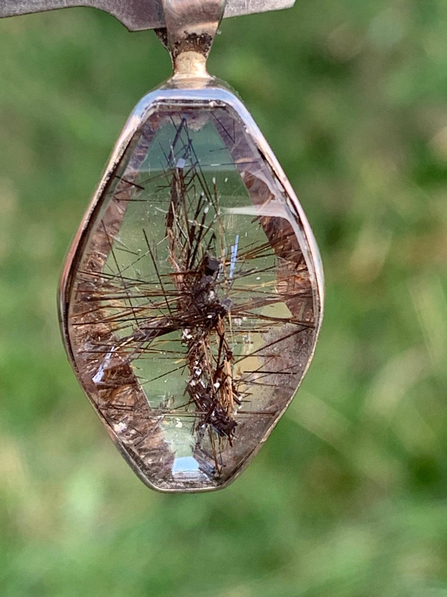 Rock crystal (quartz), with tourmaline inclusions! Silver pendant, 38 mm high x 16 x 8 - 8.3 grams. Sold with an adjustable black cord!