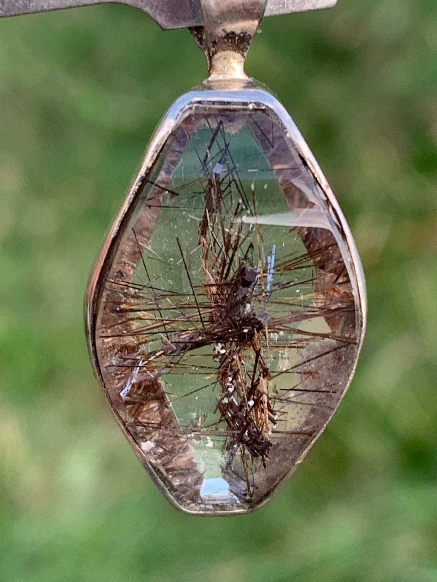 Rock crystal (quartz), with tourmaline inclusions! Silver pendant, 38 mm high x 16 x 8 - 8.3 grams. Sold with an adjustable black cord!
