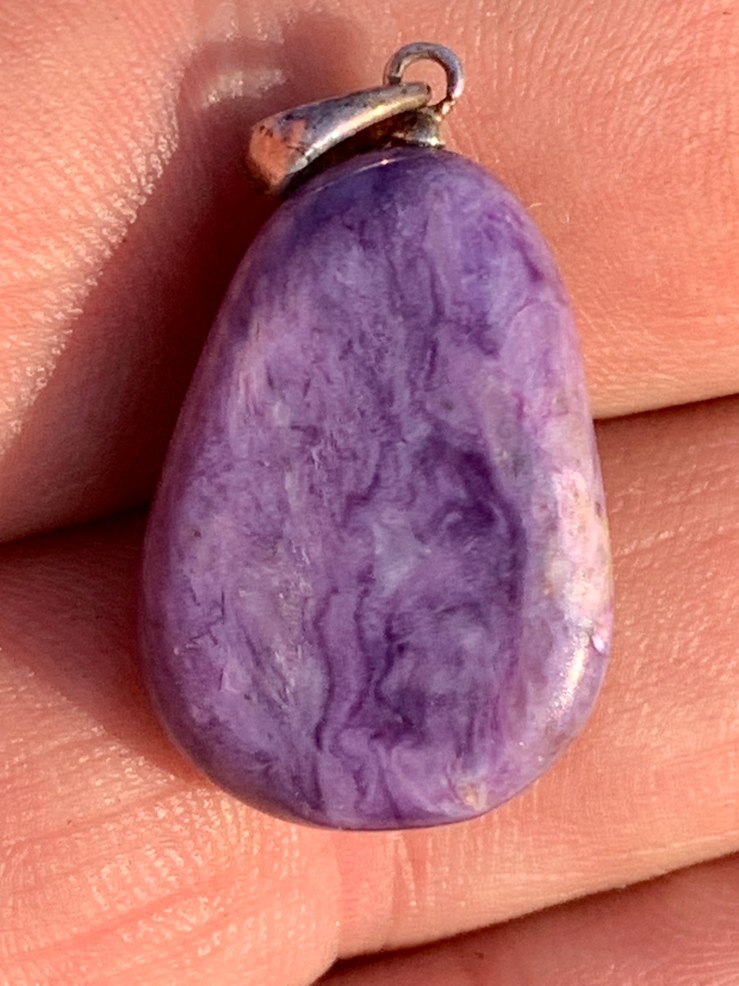 Charoite, pendant with silver clasp, 30mm x 16 x 10. Sold with adjustable black cord!