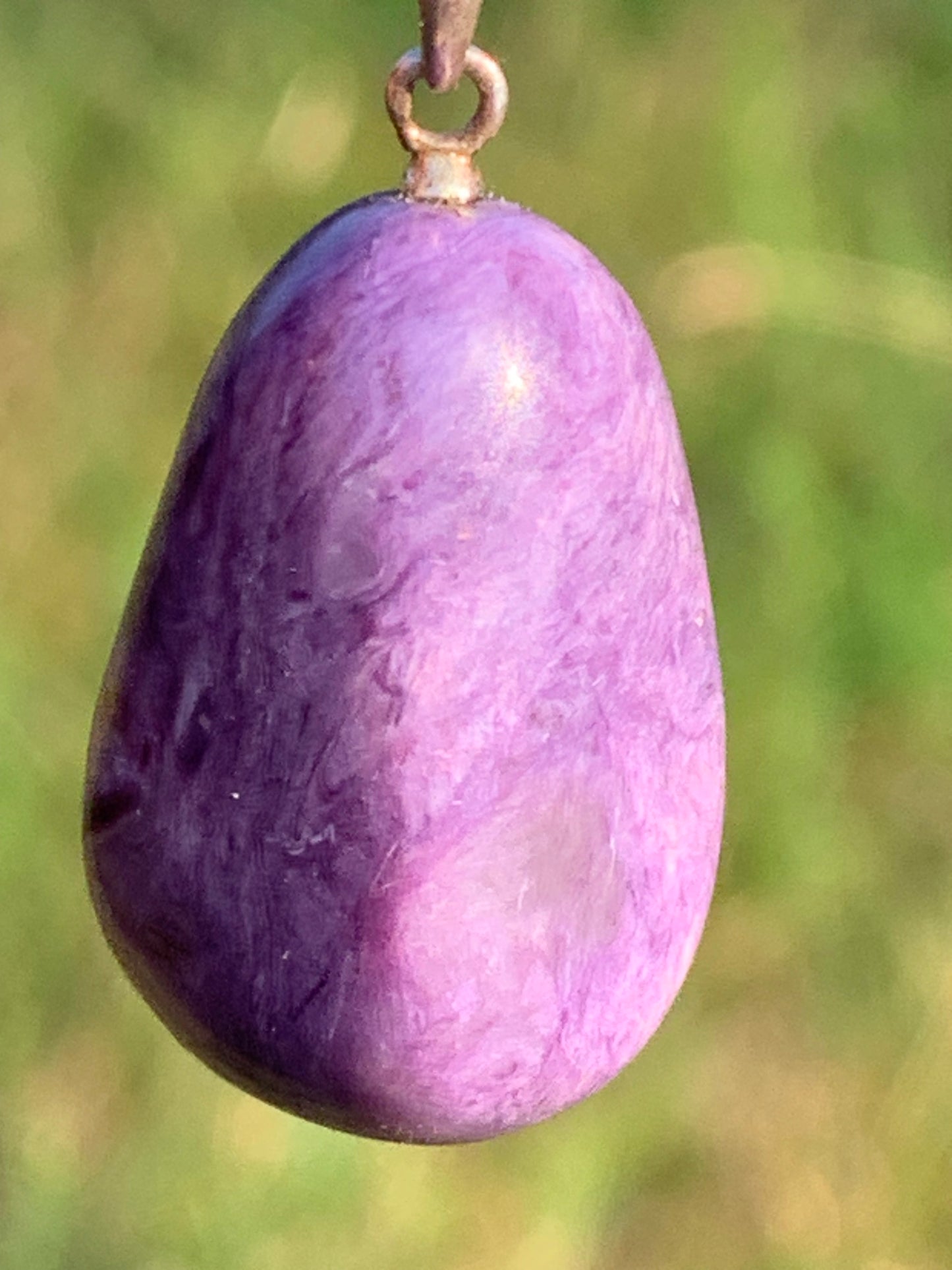 Charoite, pendant with silver clasp, 30mm x 16 x 10. Sold with adjustable black cord!