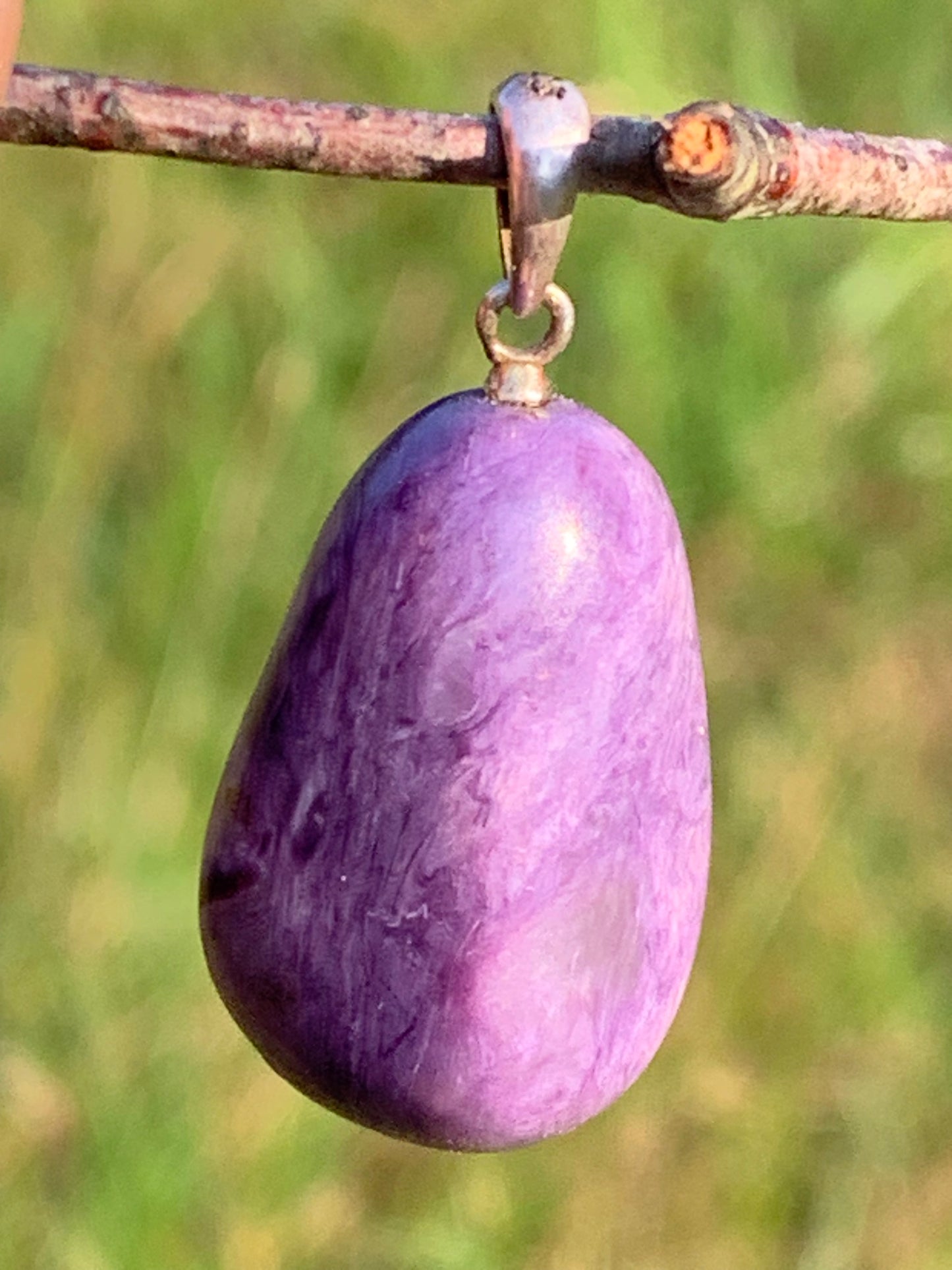 Charoite, pendant with silver clasp, 30mm x 16 x 10. Sold with adjustable black cord!