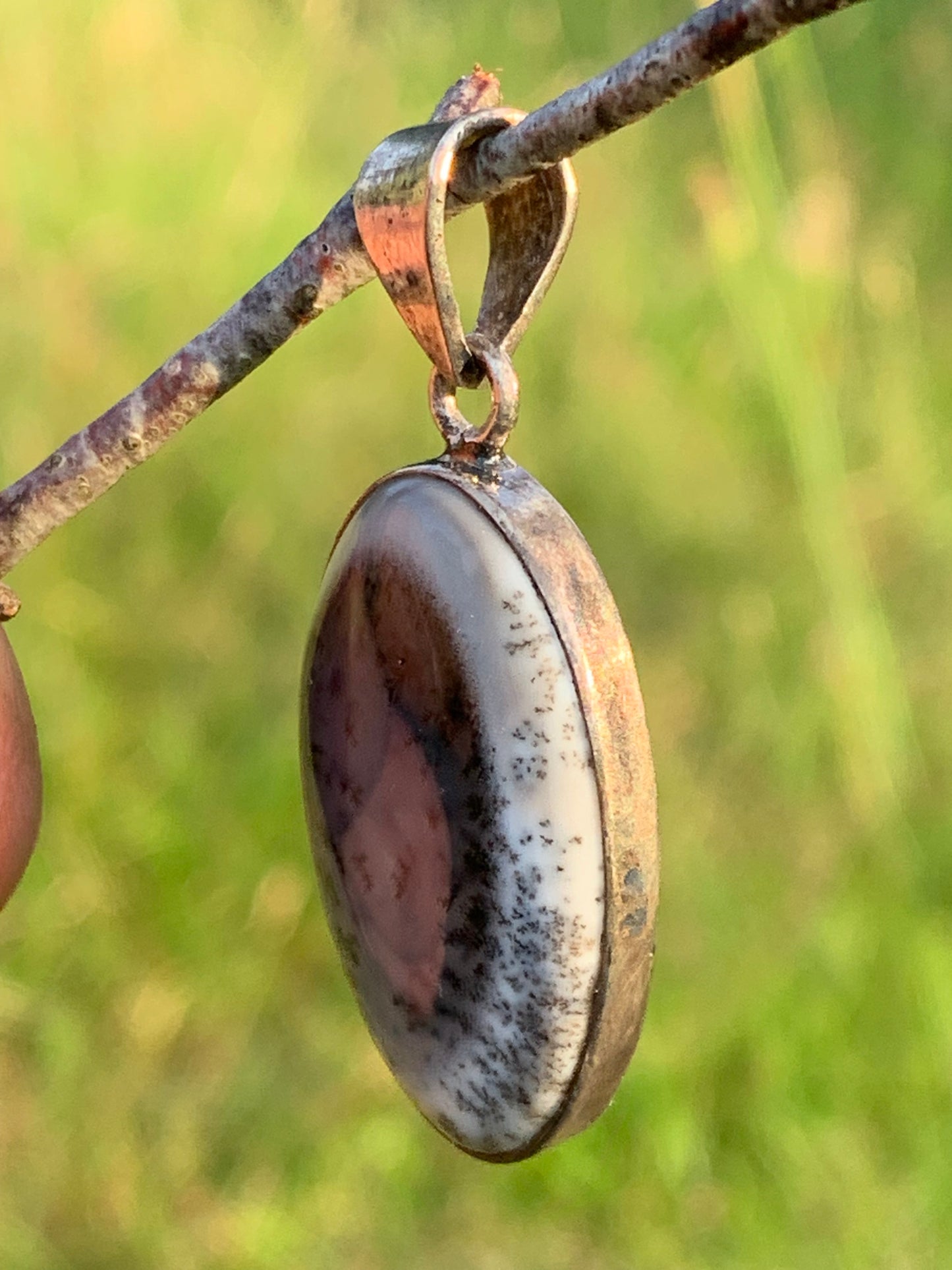 Dendritic or dentric opal, pendant set in silver, 40mm x 18 x 6. Sold with adjustable black cord, ready to wear!