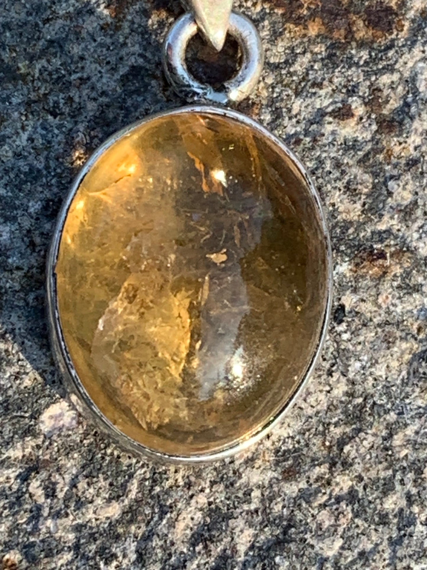 Citrine, silver medallion 30mm high x 14 x 8. Sold with adjustable cord, ready to wear!